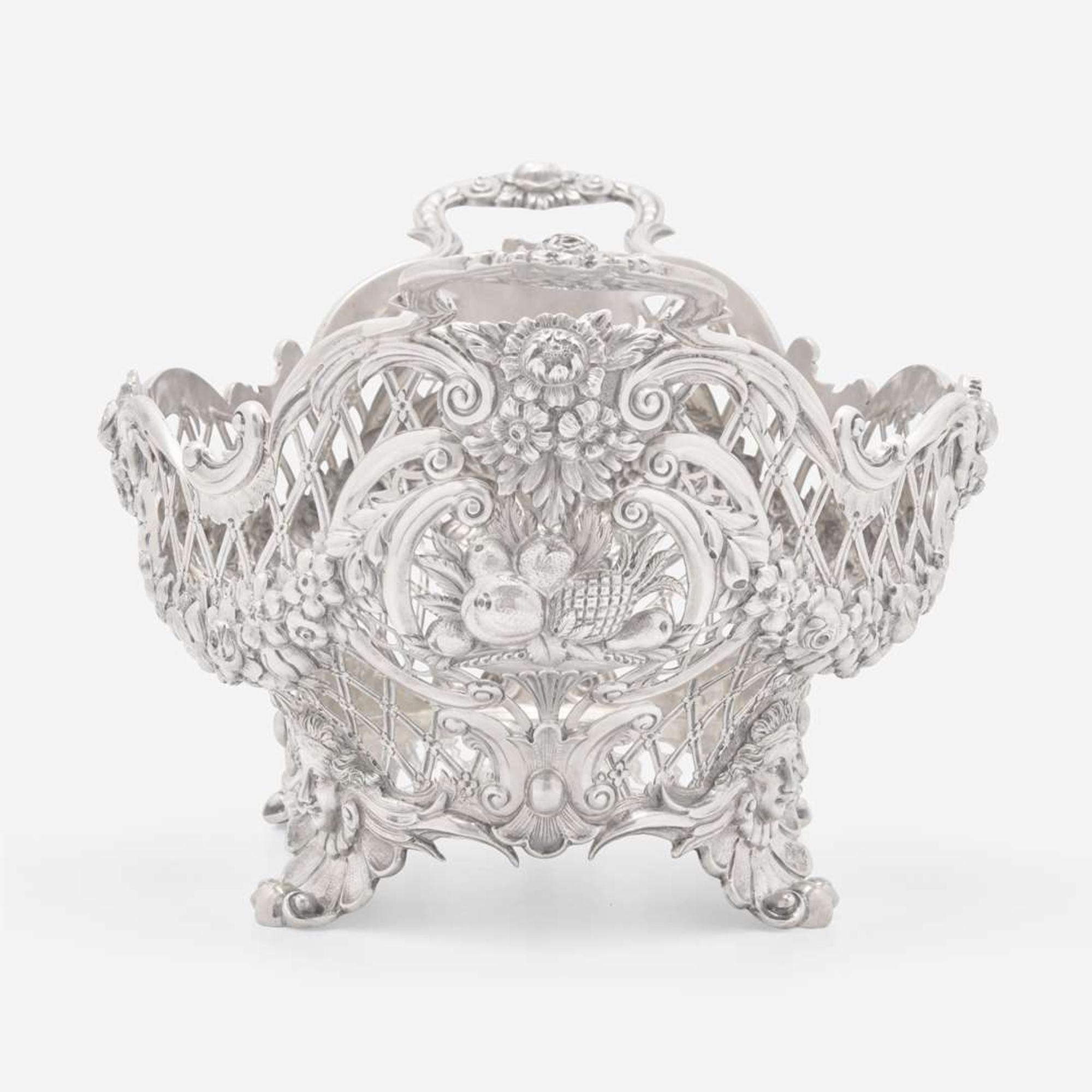 An Edward VII sterling silver reticulated centerpiece basket Maker, "HB," London, 1902