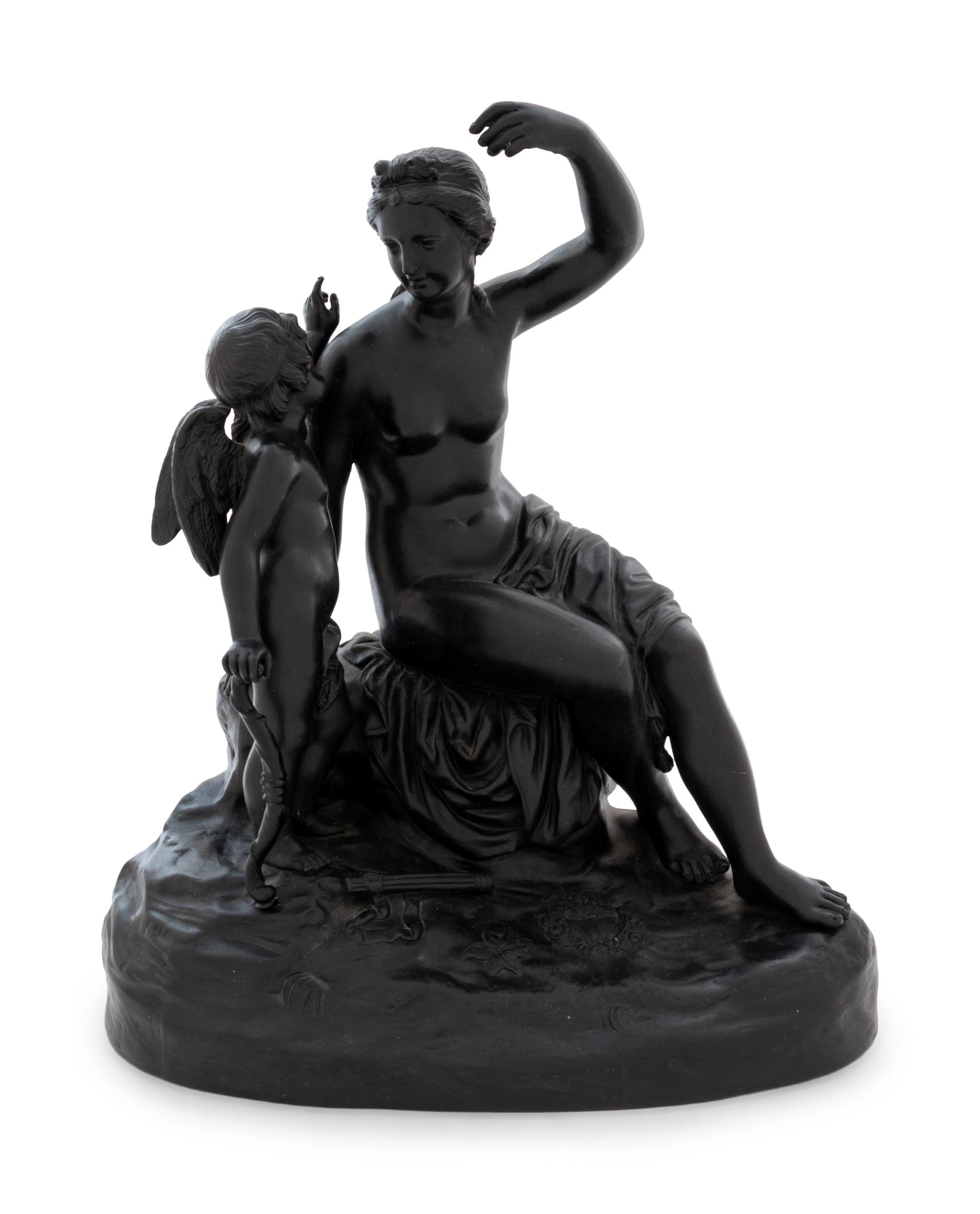 A Wedgwood Black Basalt Figural Group Depicting Cupid Disarmed