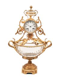A Louis XV Style Gilt Bronze and Cut Glass Clock
