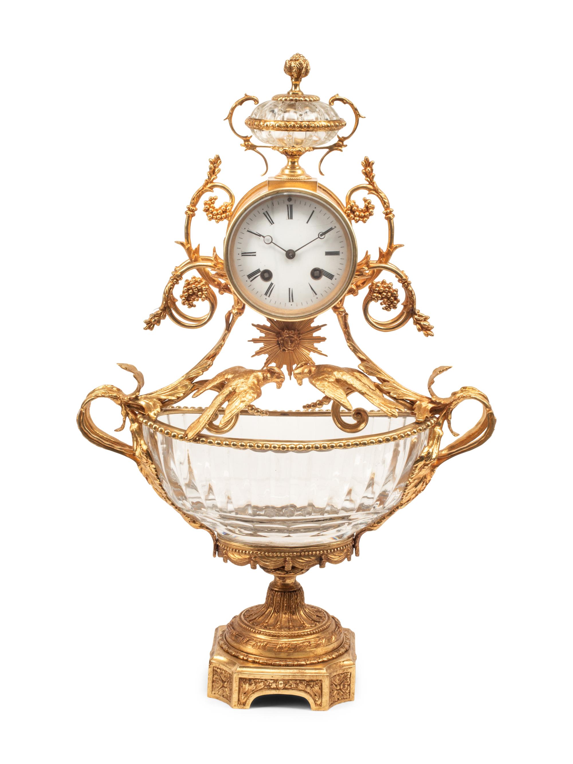 A Louis XV Style Gilt Bronze and Cut Glass Clock