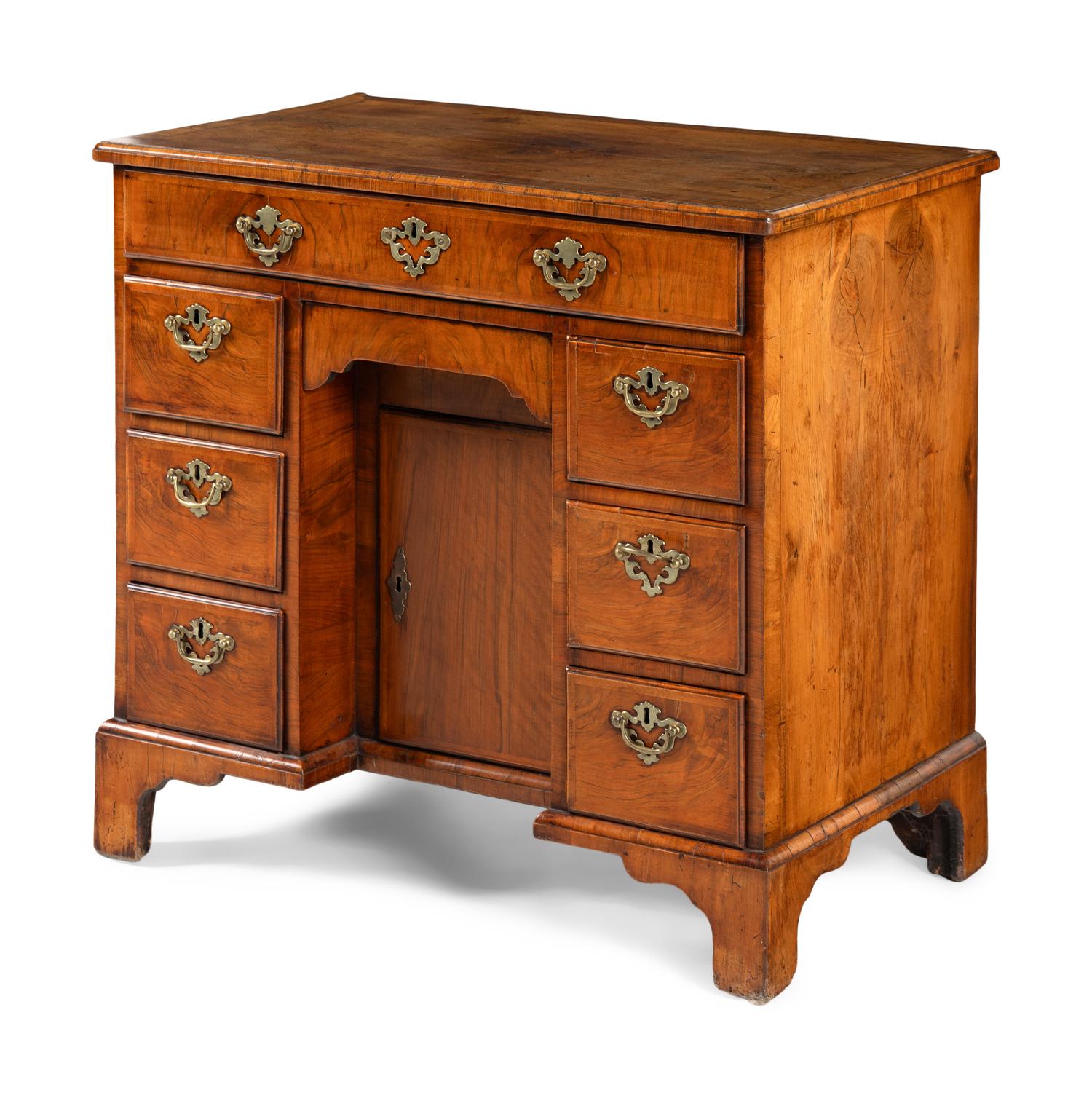 A George II Walnut Kneehole Desk