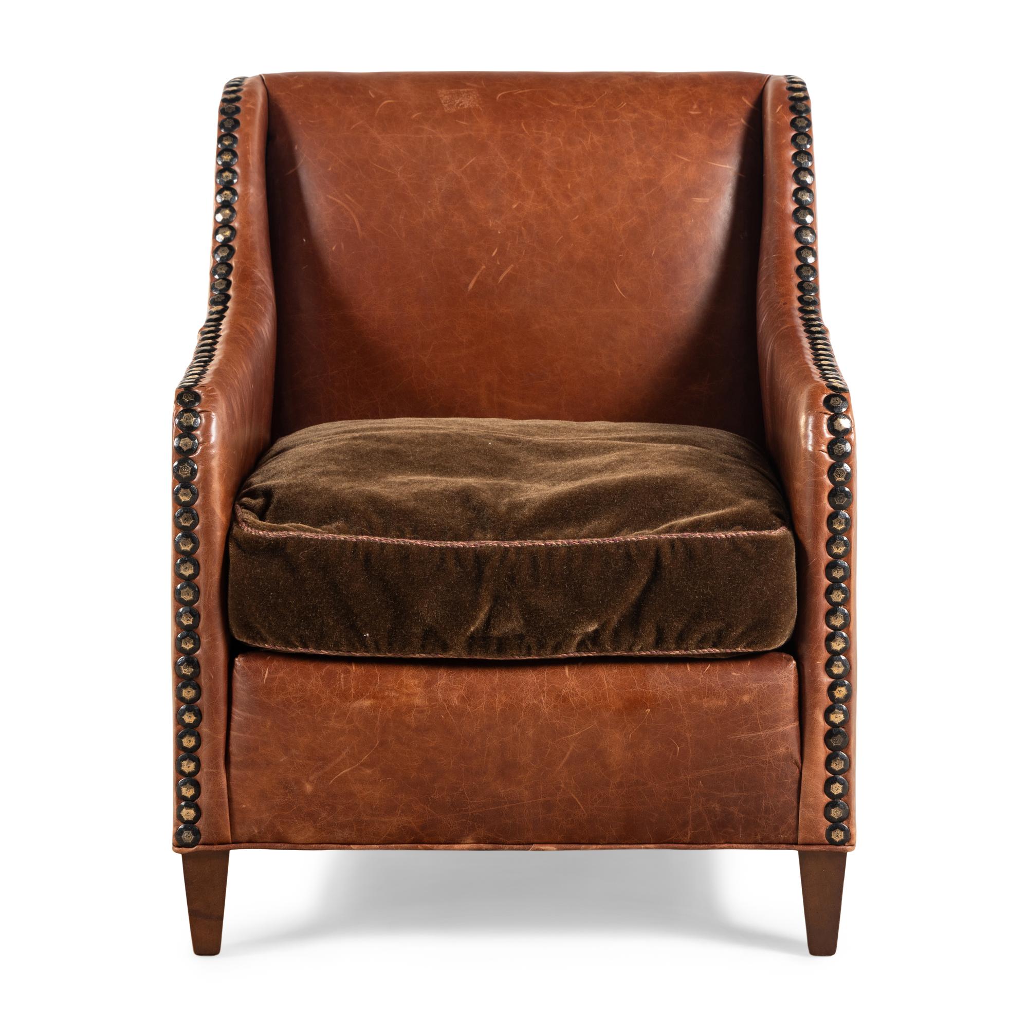 A Leather and Velvet Upholstered Armchair