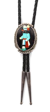 A Zuni Silver and Multiple Stone Bolo, Beverly Etsate Height 1 5/8 x width 1 1/4 inches.