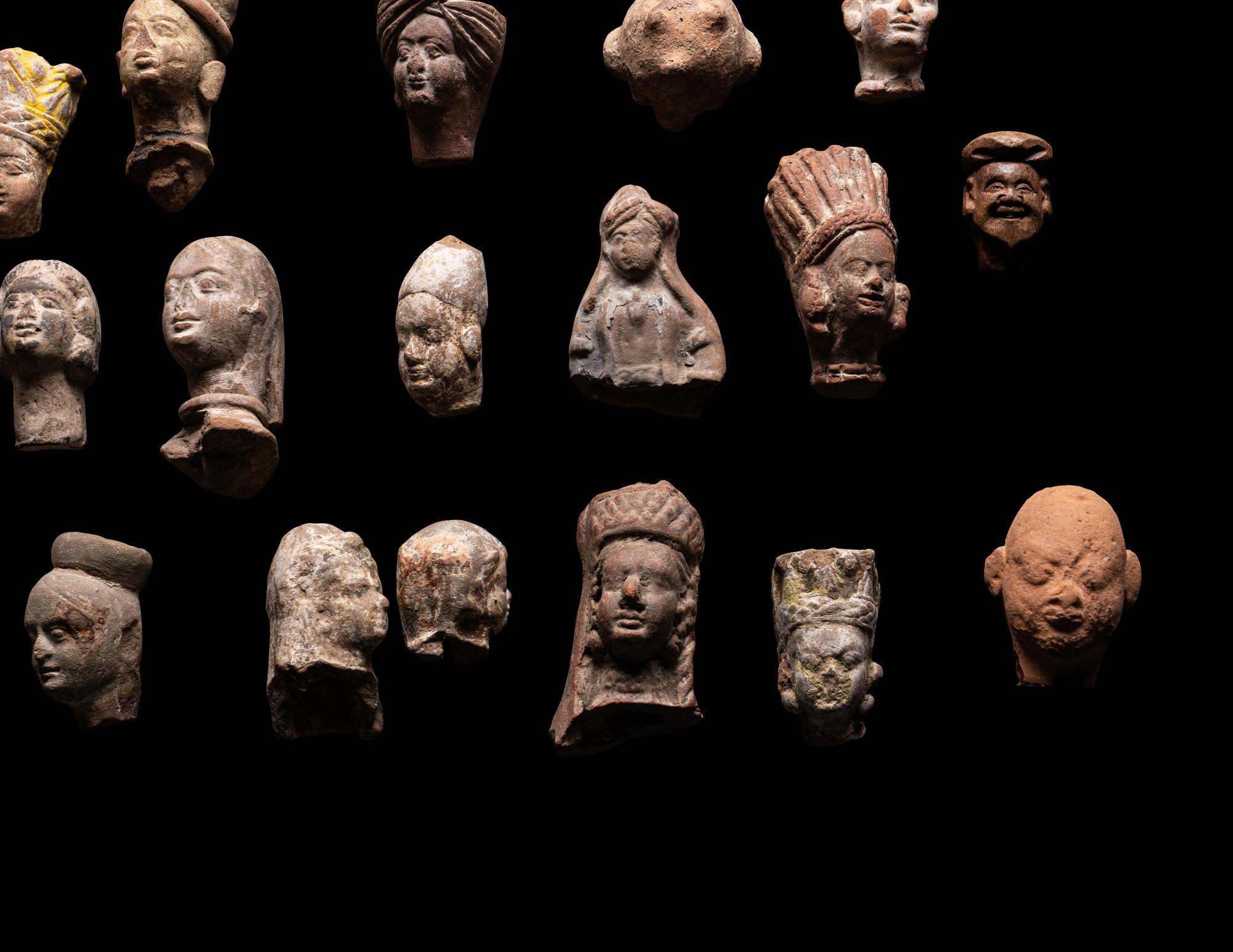 A Group of 65 Gandharan Terracotta Heads