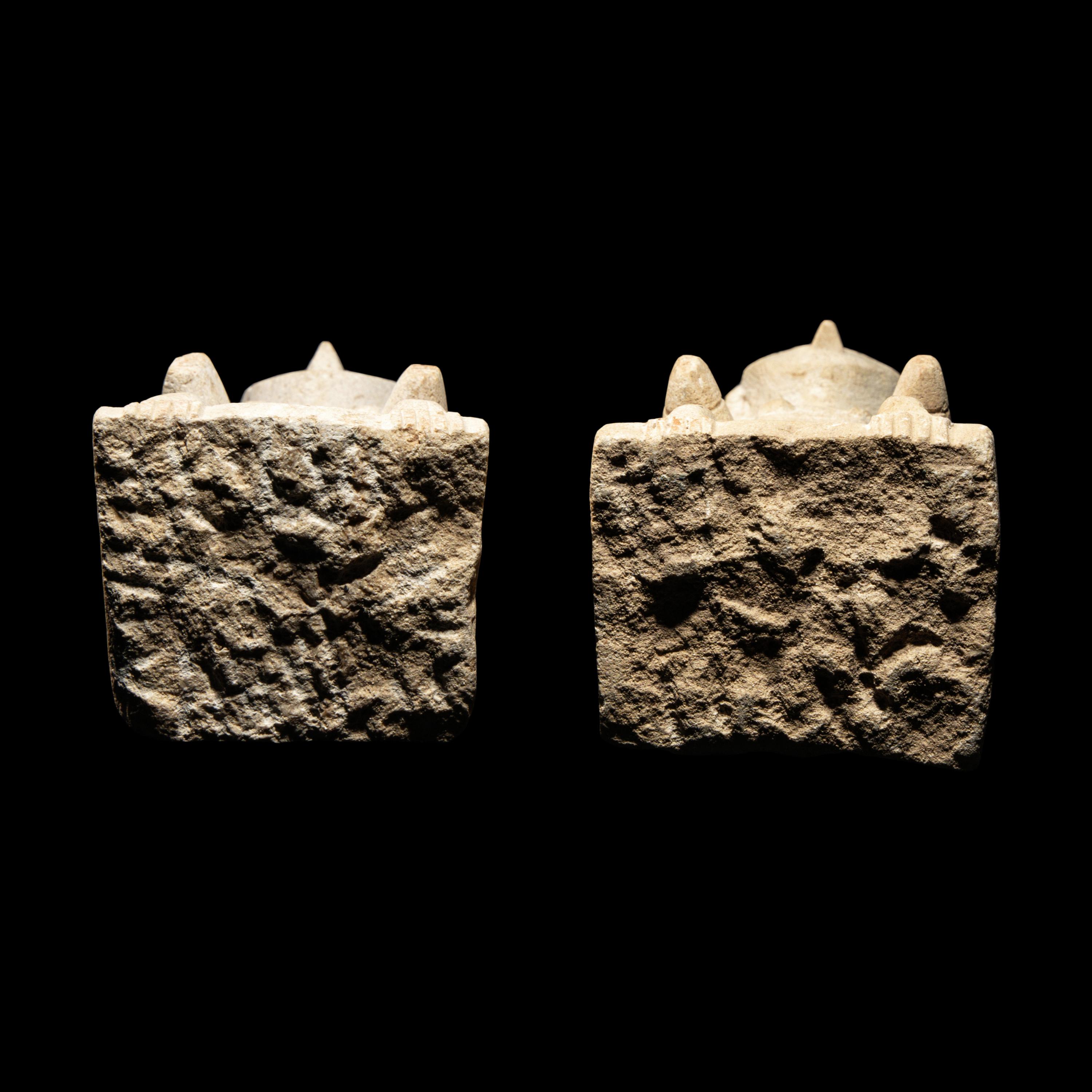A Pair of South Arabian Limestone Seated Figures