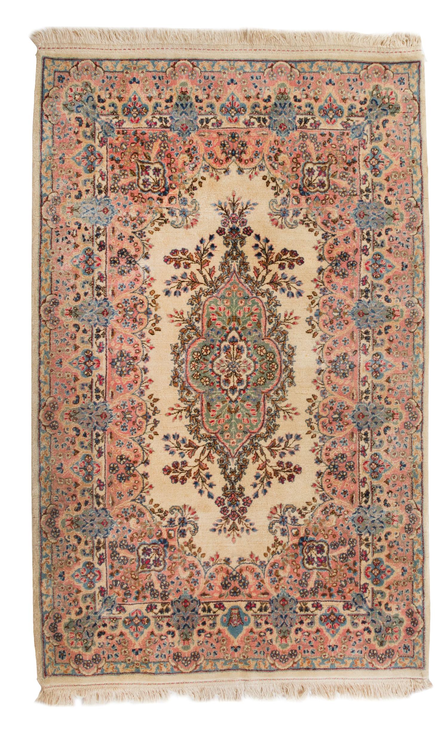 A Pair of Kirman Wool Rugs