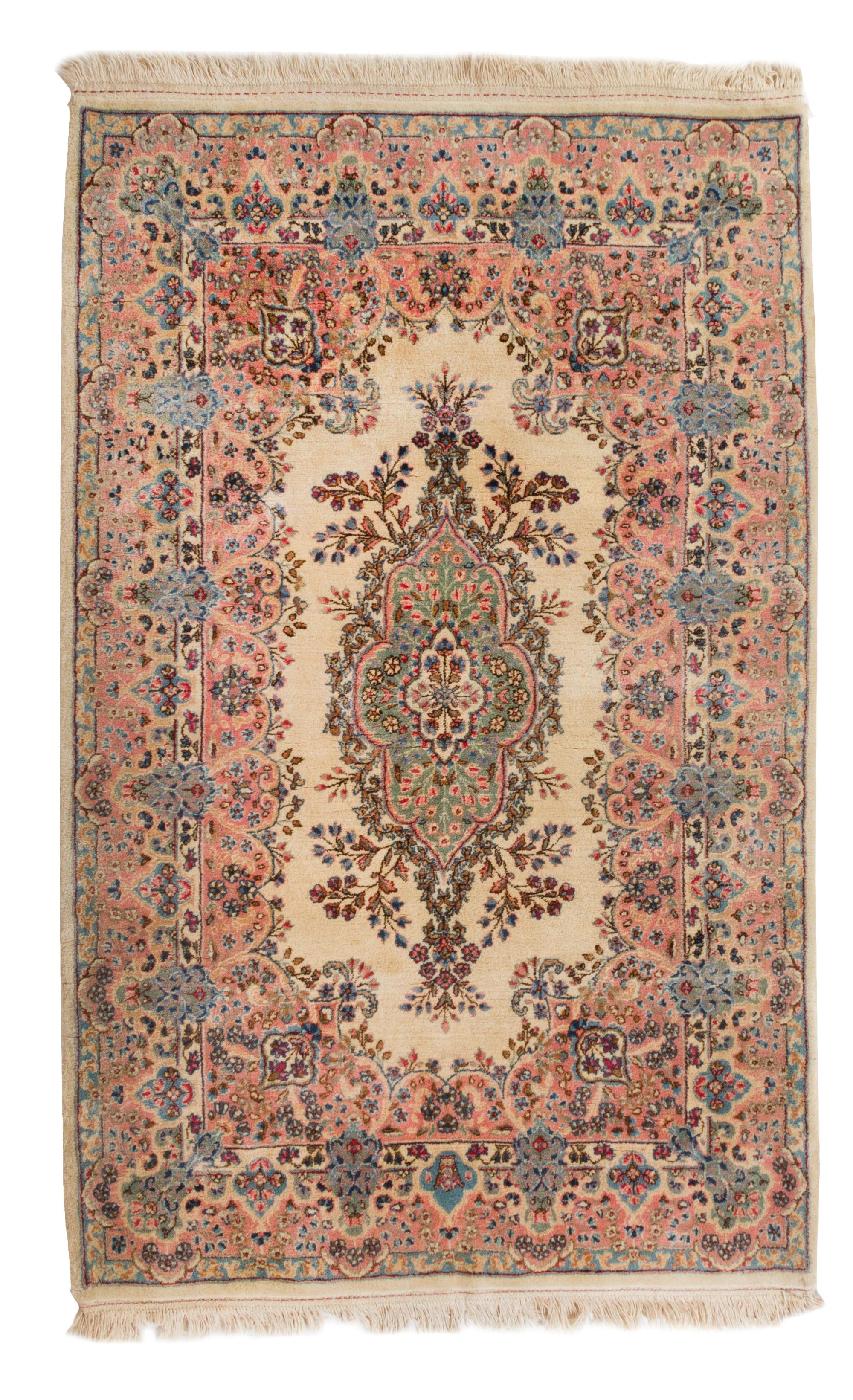 A Pair of Kirman Wool Rugs