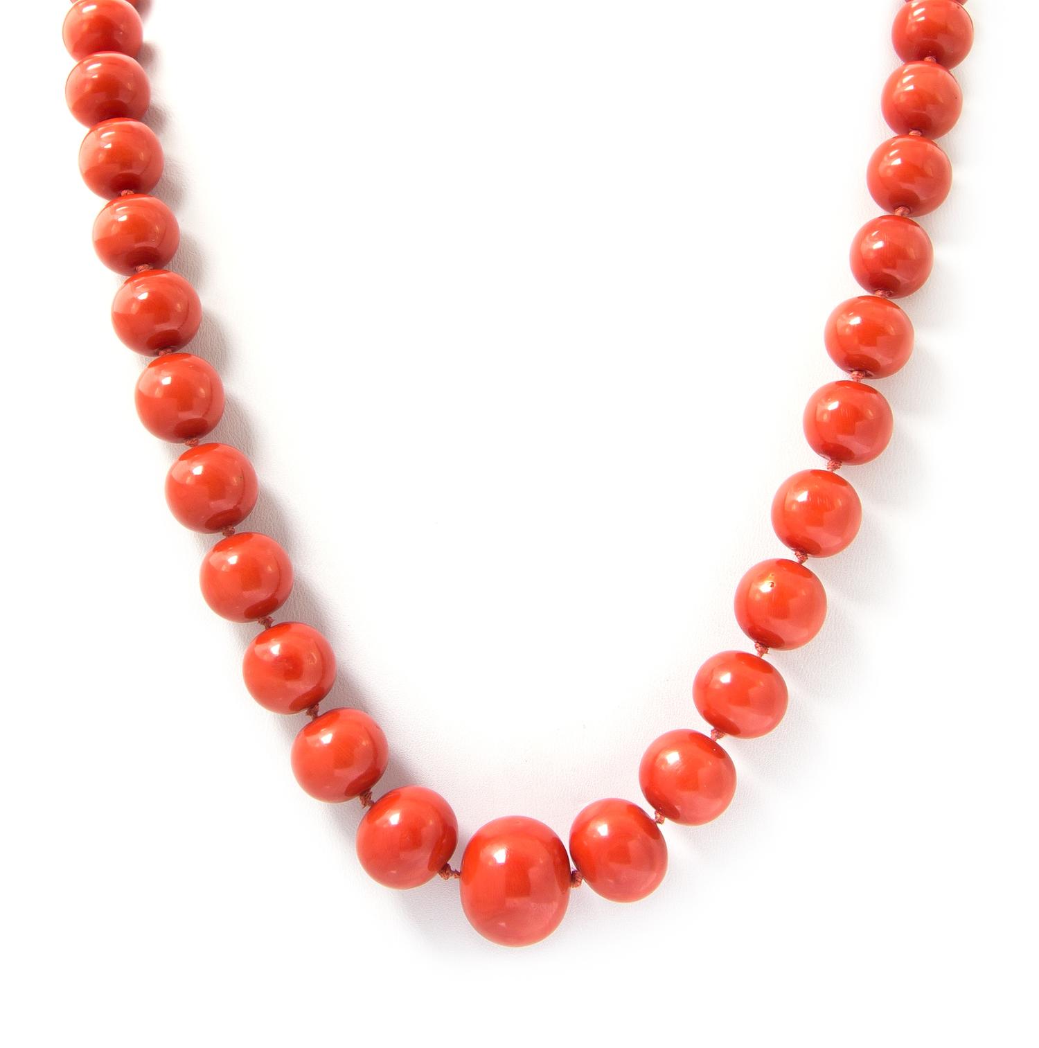 An Impressive Graduated Single Strand Coral Bead Necklace,