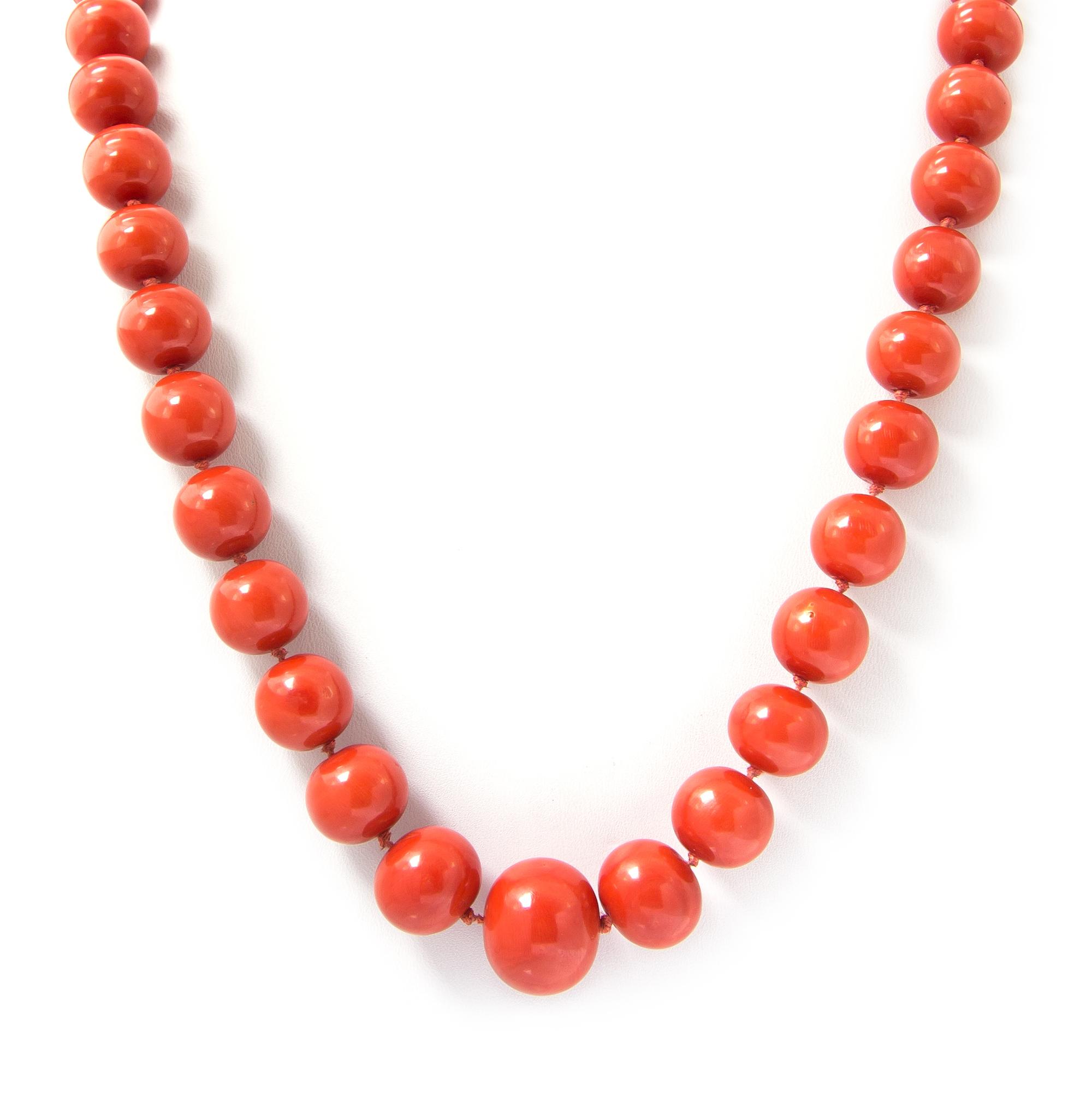 An Impressive Graduated Single Strand Coral Bead Necklace,