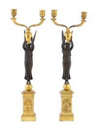A Pair of Empire Style Gilt and Patinated Bronze Figural Two-Light Candelabra