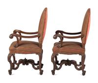 A Pair of Louis XV Style Carved Walnut Fauteuils