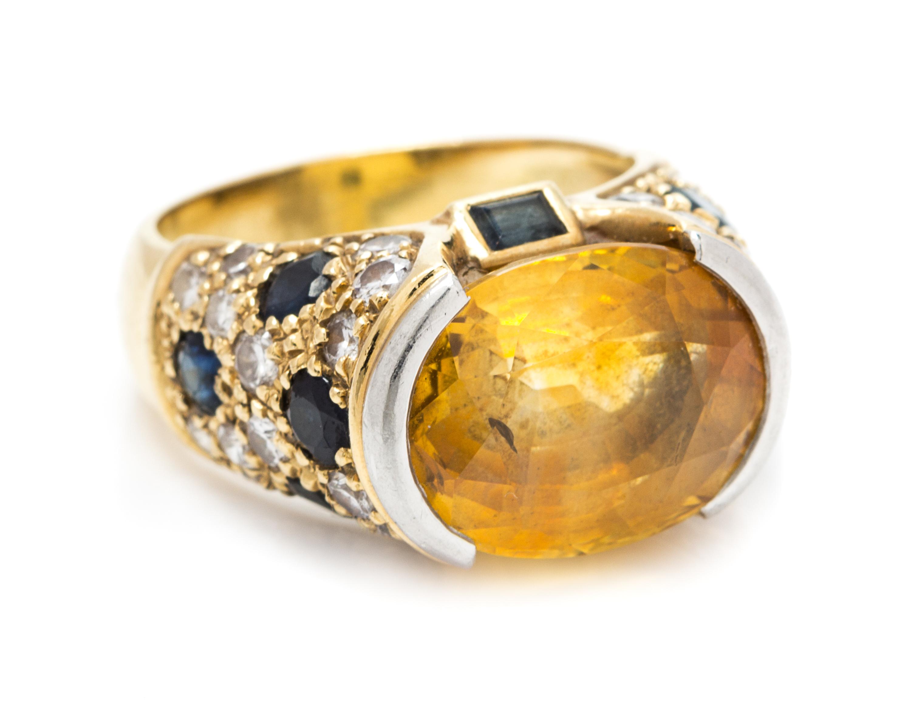 A Yellow Gold, Platinum, Yellow Sapphire, Sapphire and Diamond Ring, 6.00 dwts.