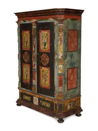 A Continental Carved, Painted and Parcel Gilt Pine Schrank