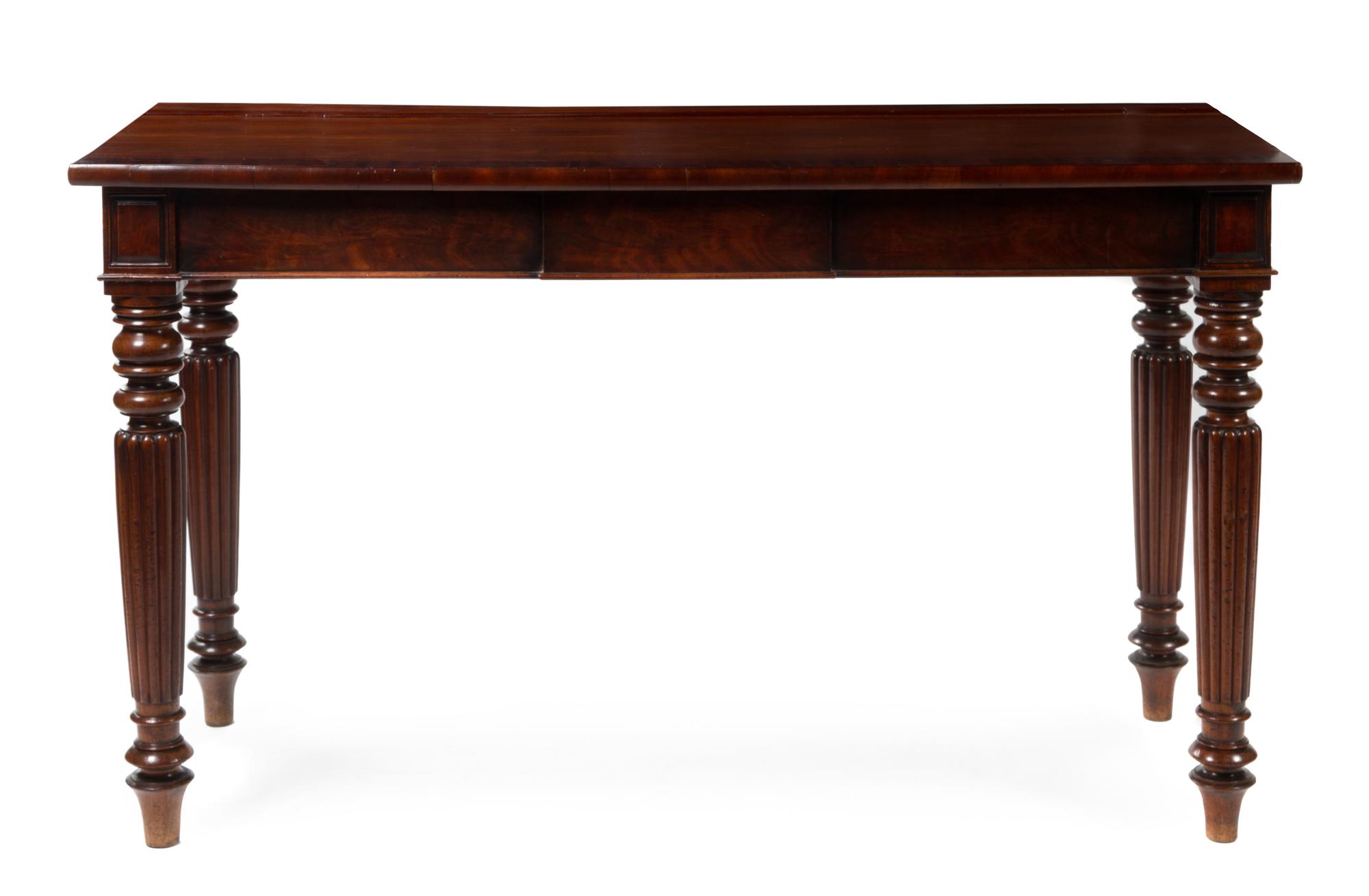 A William IV Mahogany Console Table Height 37 1/2 x width 63 1/4 x depth 24 1/2 inches. — SECOND QUARTER 19TH CENTURY