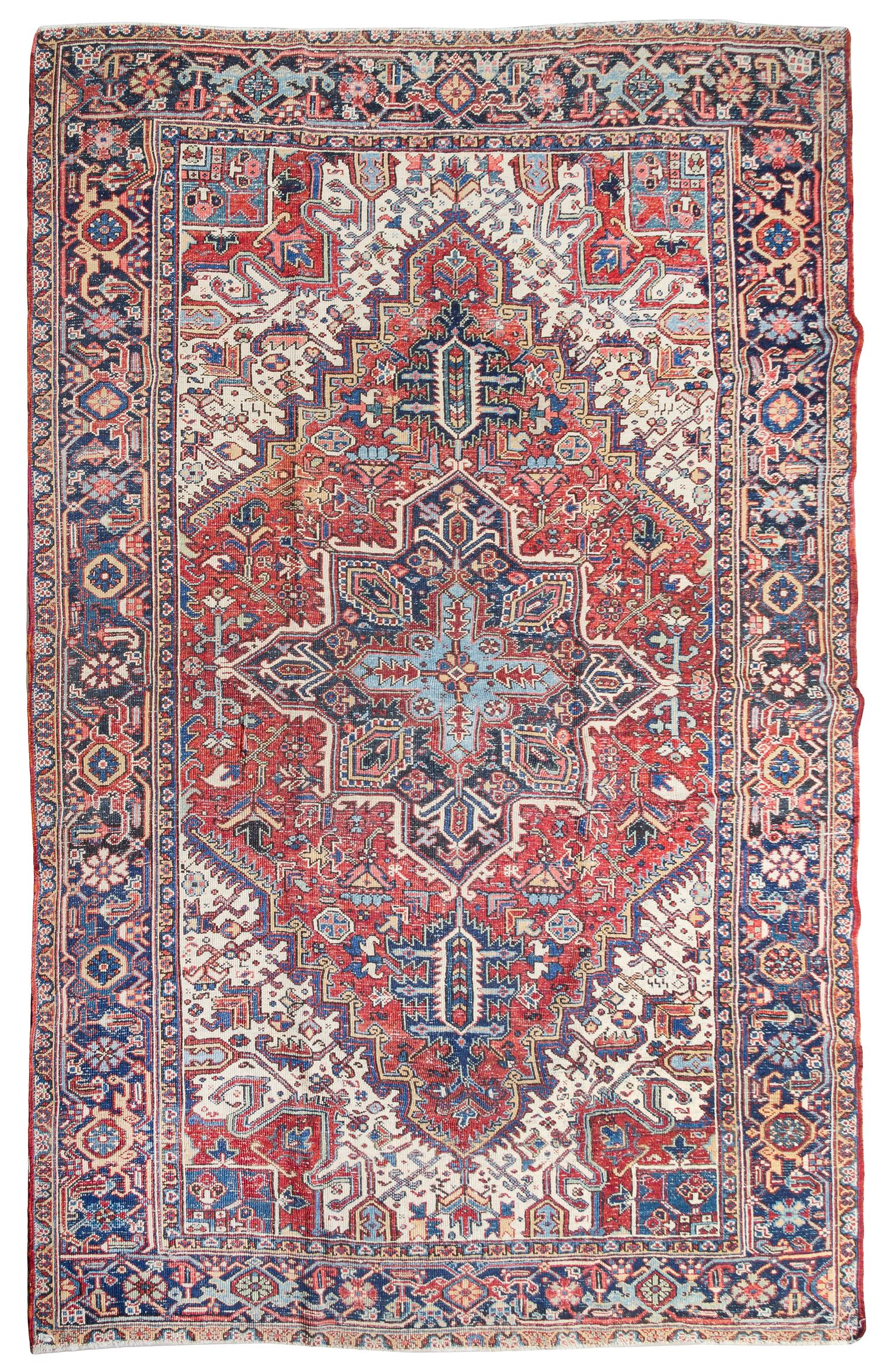 A Heriz Wool Rug 10 feet 5 inches x 7 feet 10 inches. — CIRCA 1900