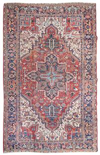 A Heriz Wool Rug 10 feet 5 inches x 7 feet 10 inches. — CIRCA 1900