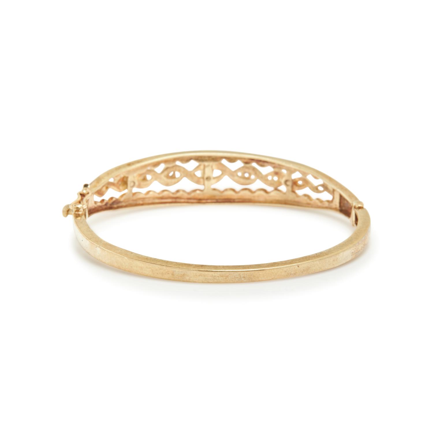 COLLECTION OF YELLOW GOLD AND DIAMOND BANGLE BRACELETS