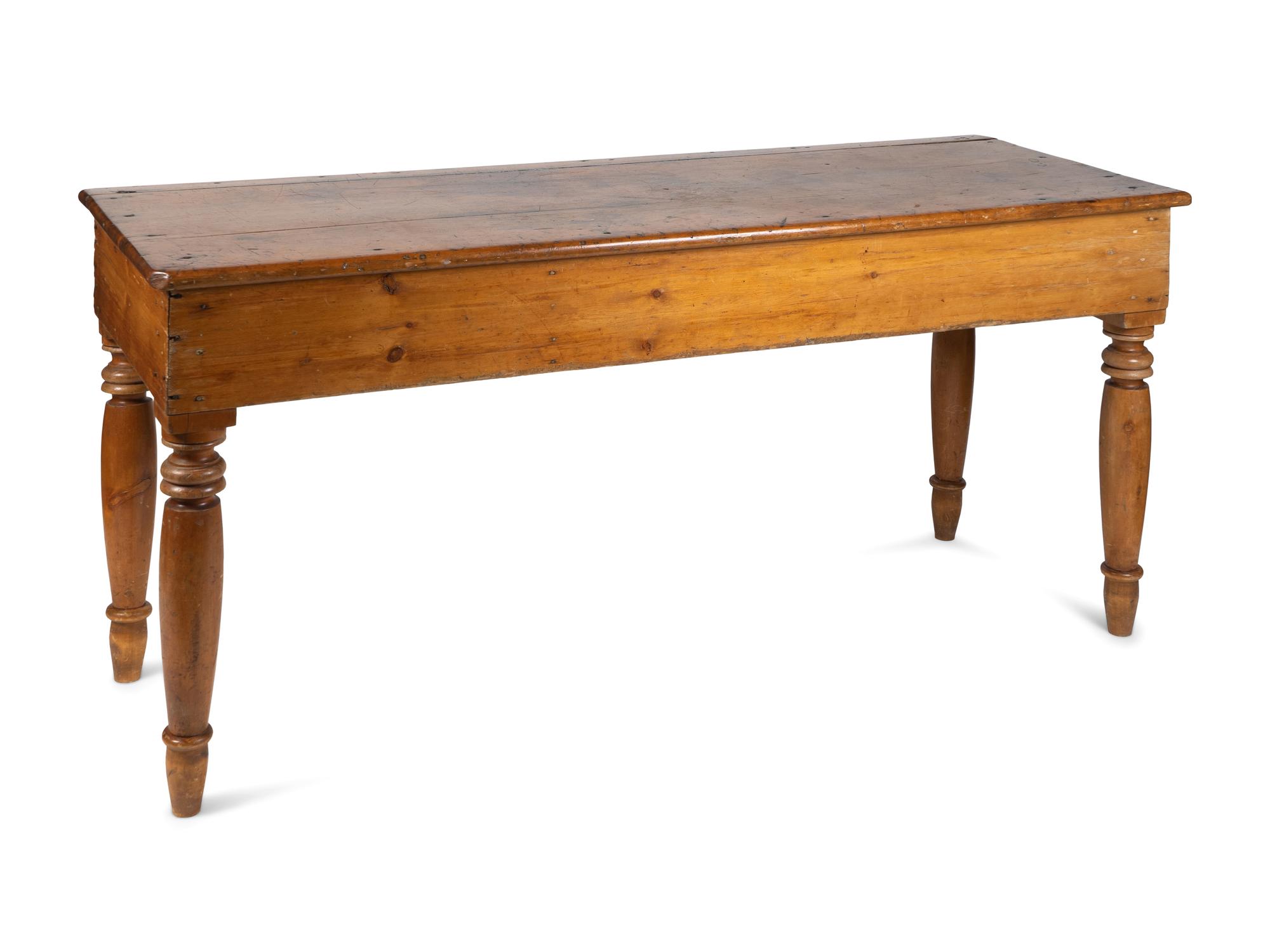 A Continental Provincial Pine Farm Table — 19TH CENTURY
