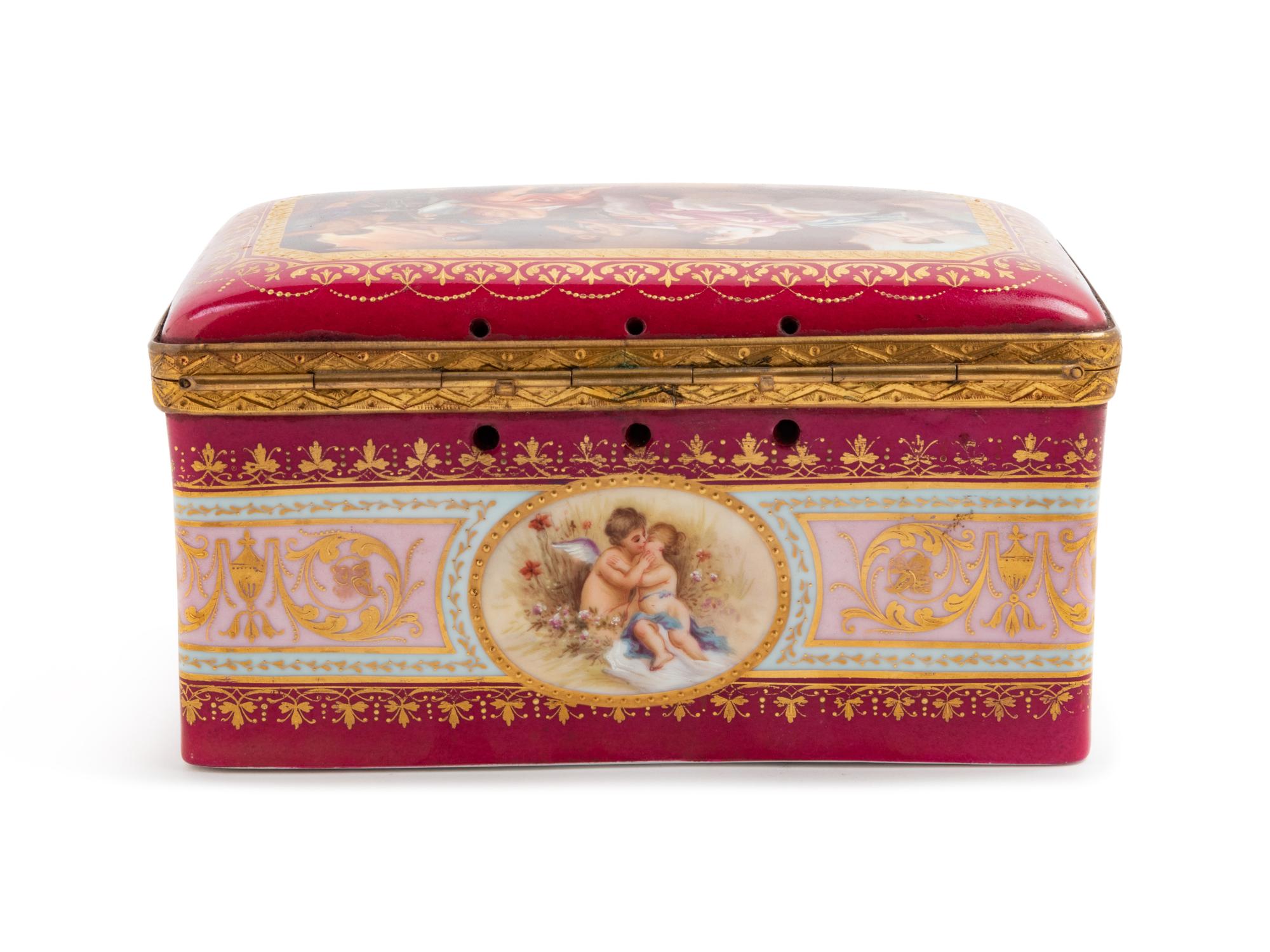 A Vienna Gilt Metal Mounted, Painted and Parcel Gilt Porcelain Table Casket