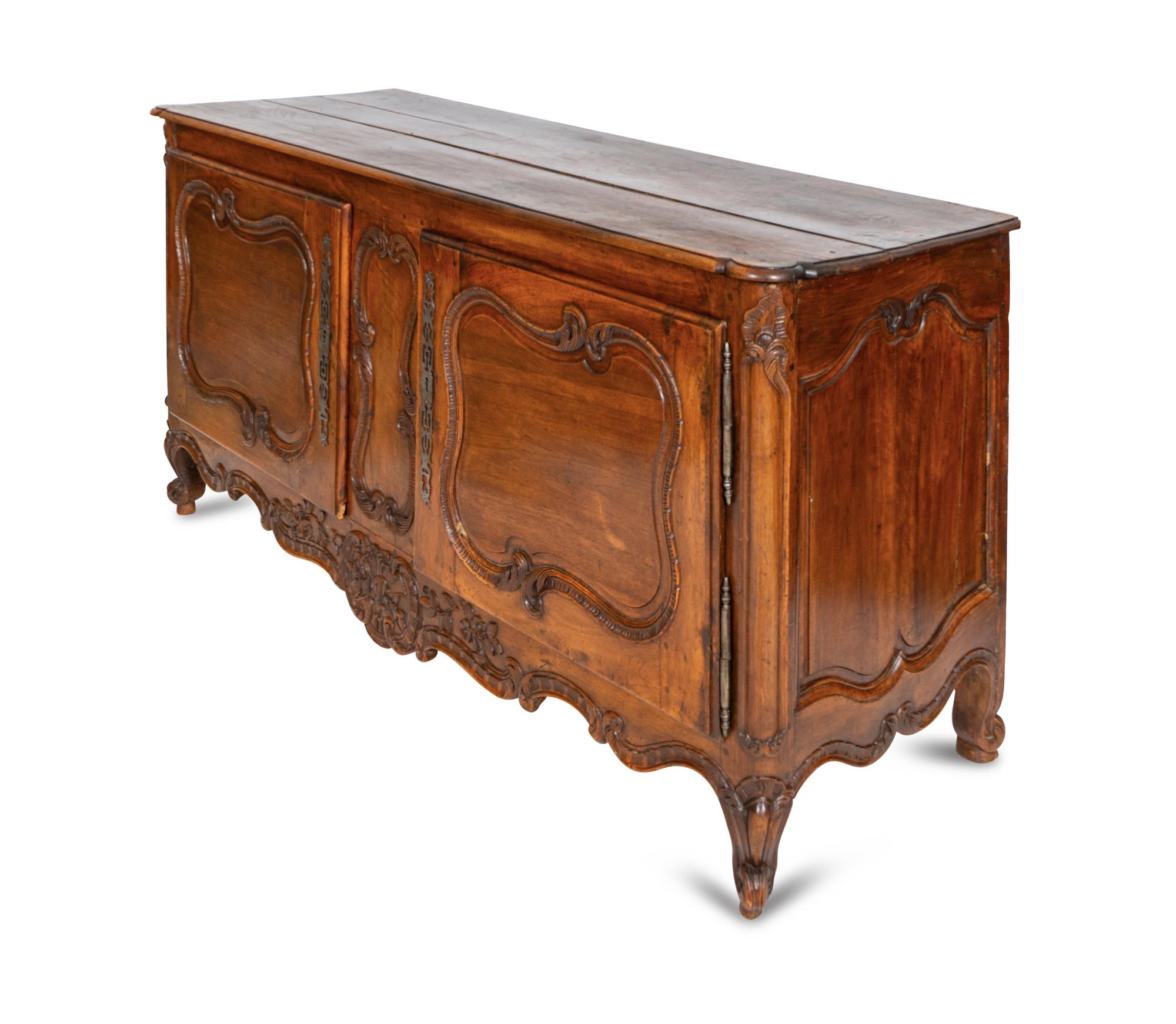 A Louis XV Provincial Carved Walnut Buffet de Chasse