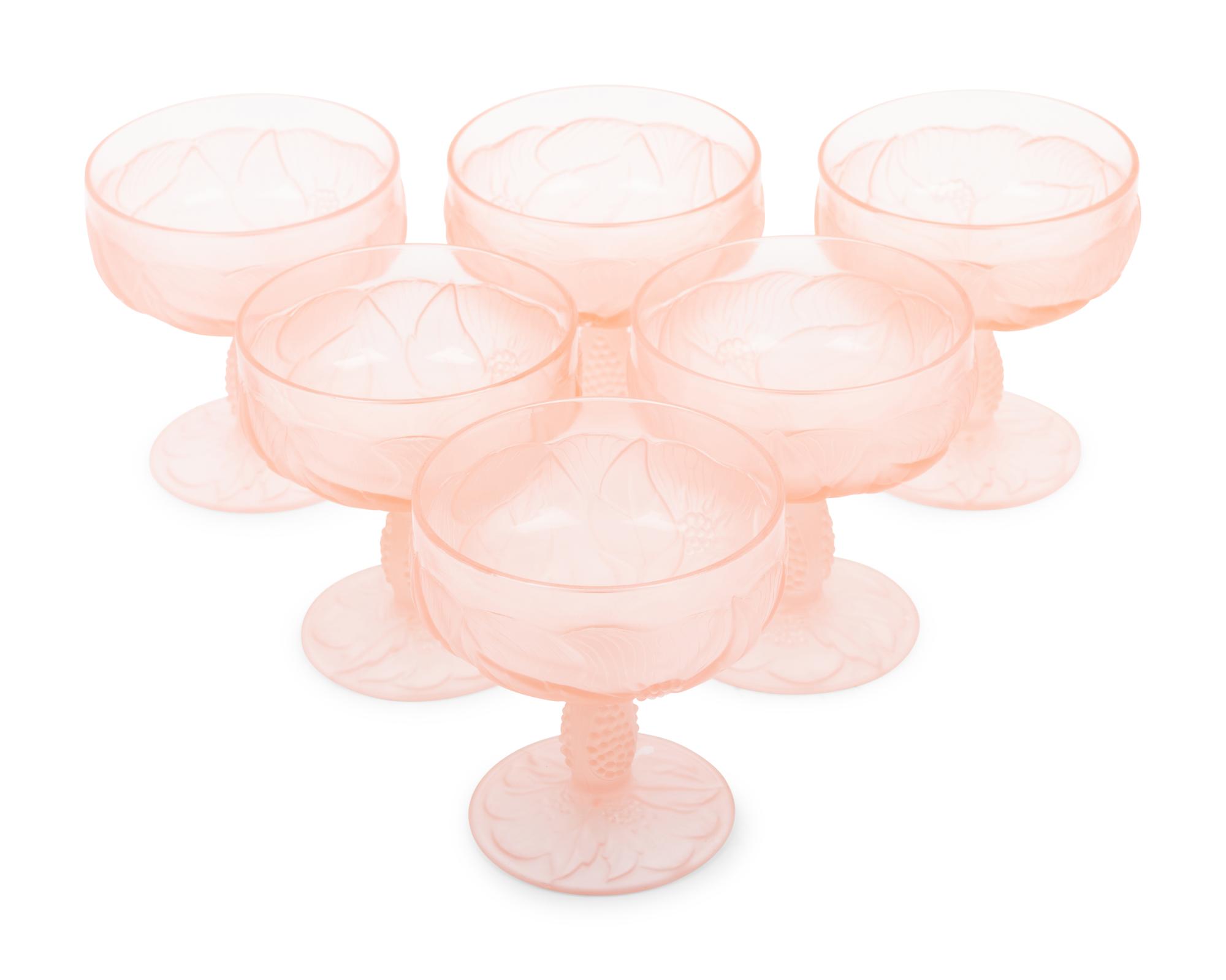 A Set of Pink Molded and Frosted Glass Stemware Articles