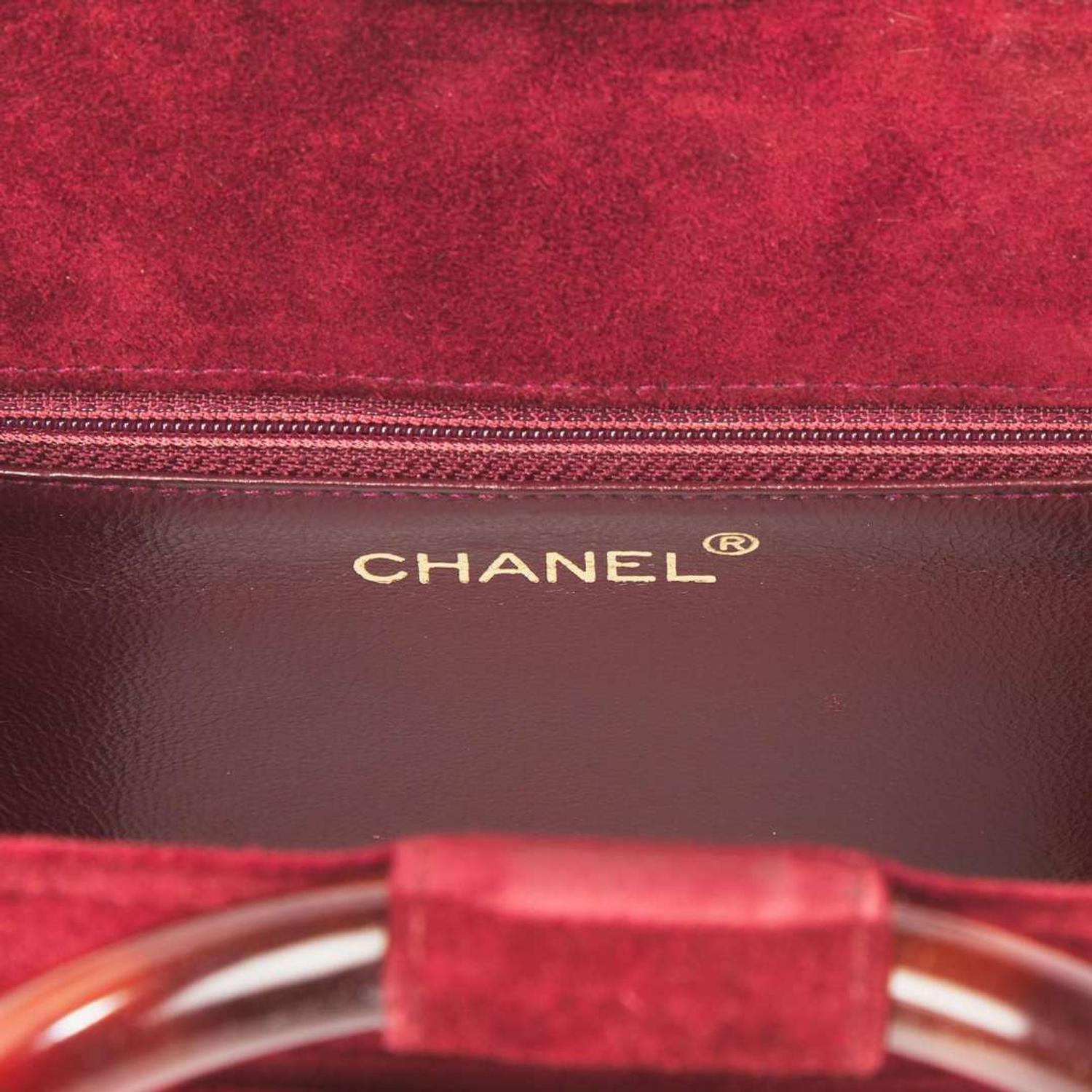 A Rare Vintage Chanel Burgundy Suede Handbag Chanel