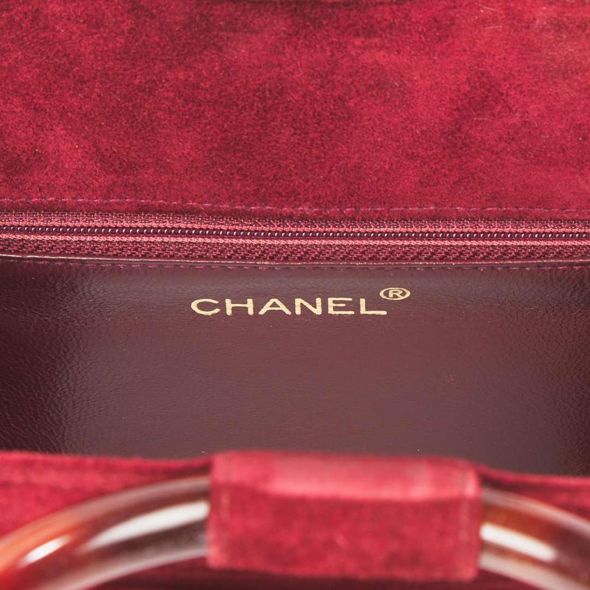 A Rare Vintage Chanel Burgundy Suede Handbag Chanel