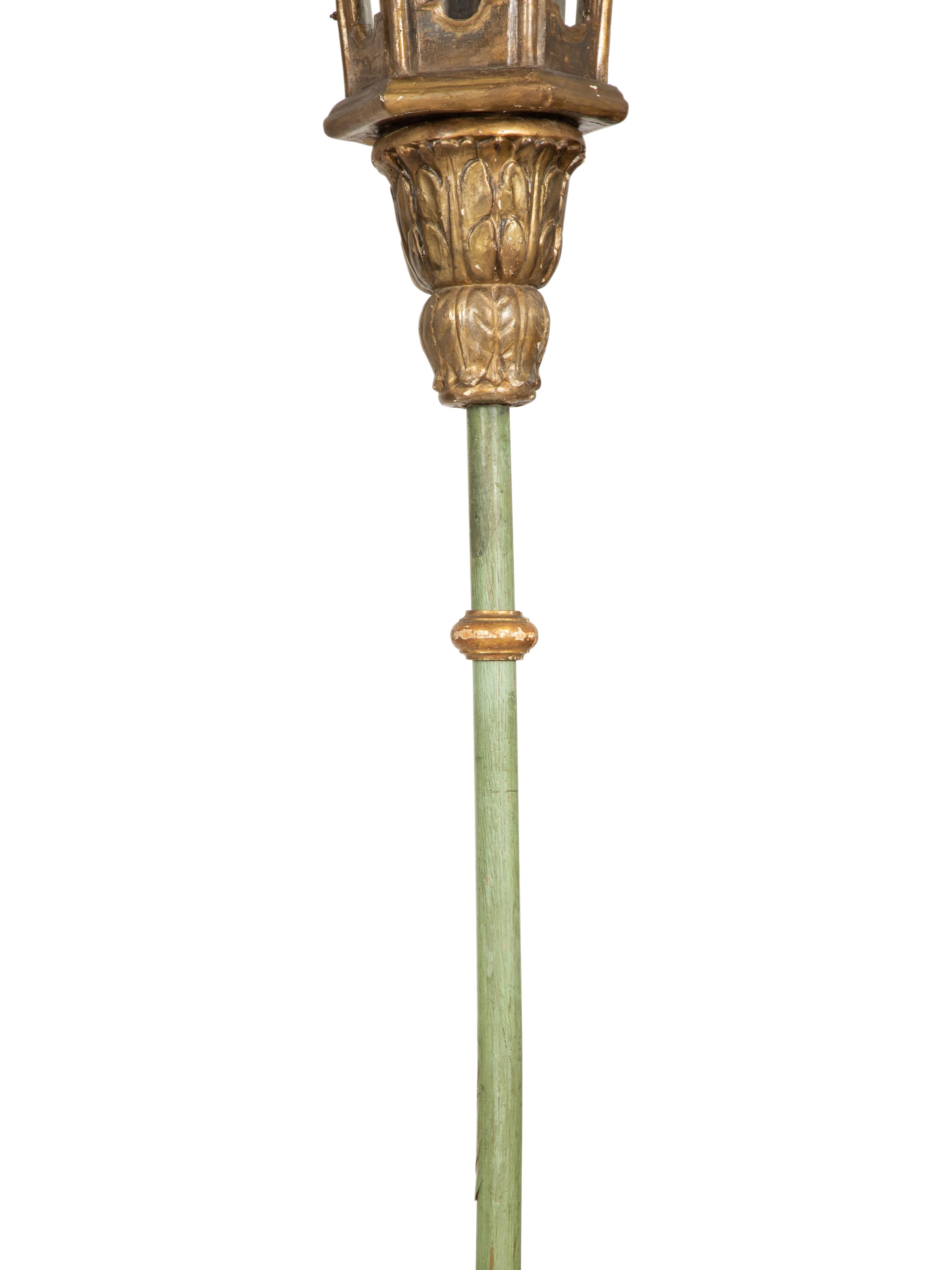 A Pair of Venetian Painted and Parcel Gilt Gondola Lanterns in Marblelized Bases