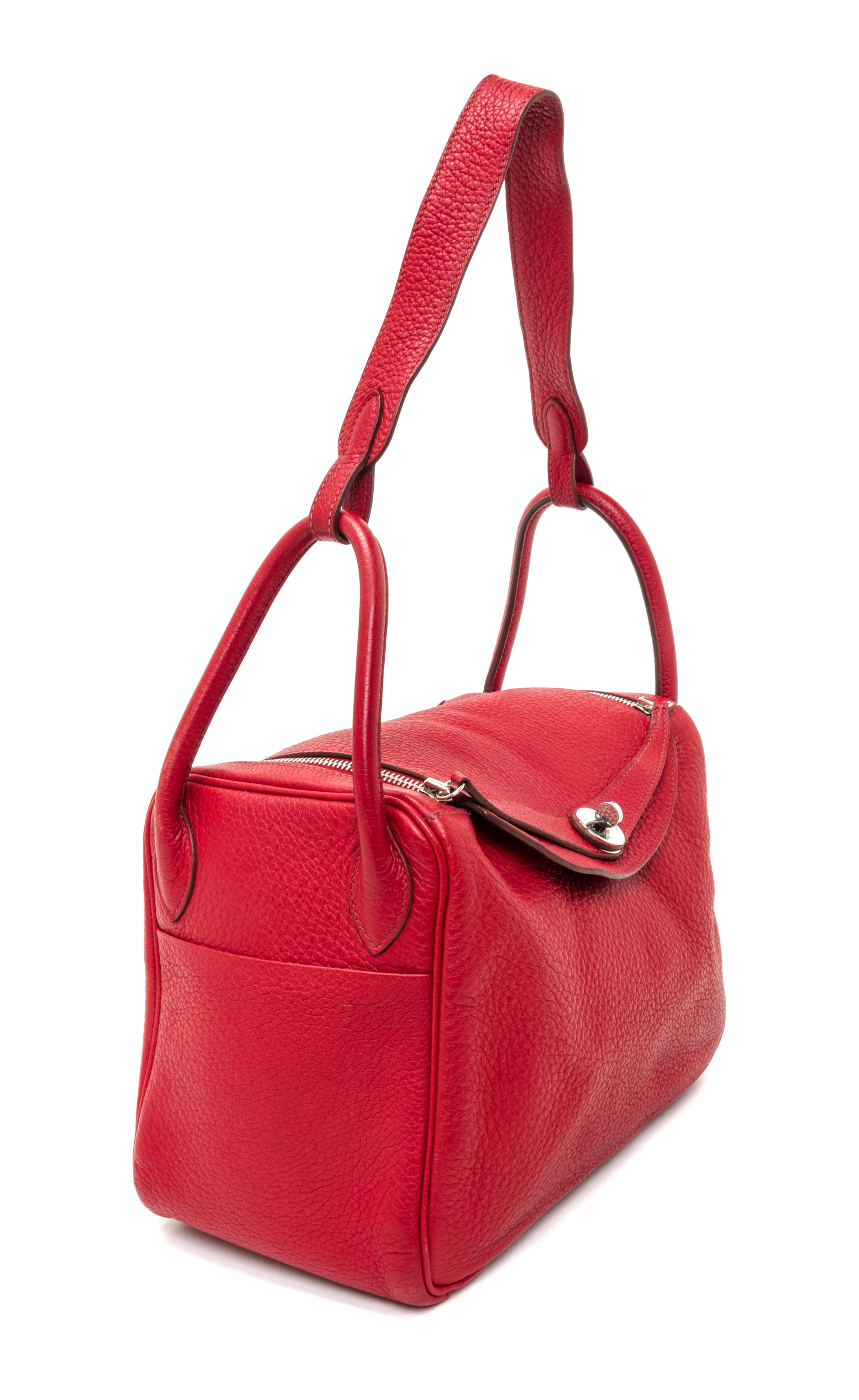 An Hermes Rouge Garance Taurillon Clemence Lindy 30 Handbag, 12" x 7.5" x 6.5".