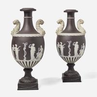 A Pair of Wedgwood Black Dip Jasperware and Black Basalt "Panther" Vases UK, late 19th century