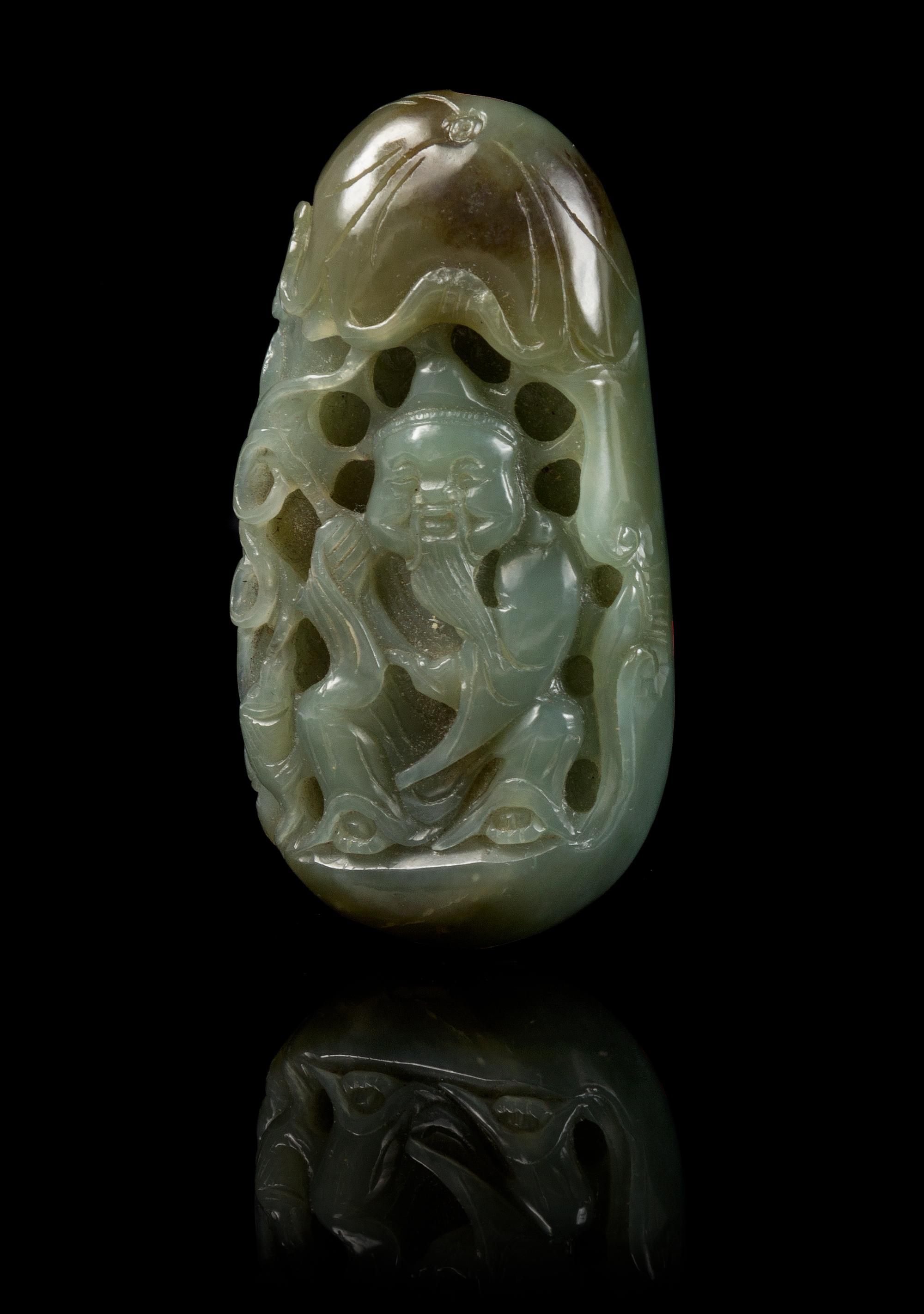 A Carved Jade Toggle Length 3 1/8 inches.