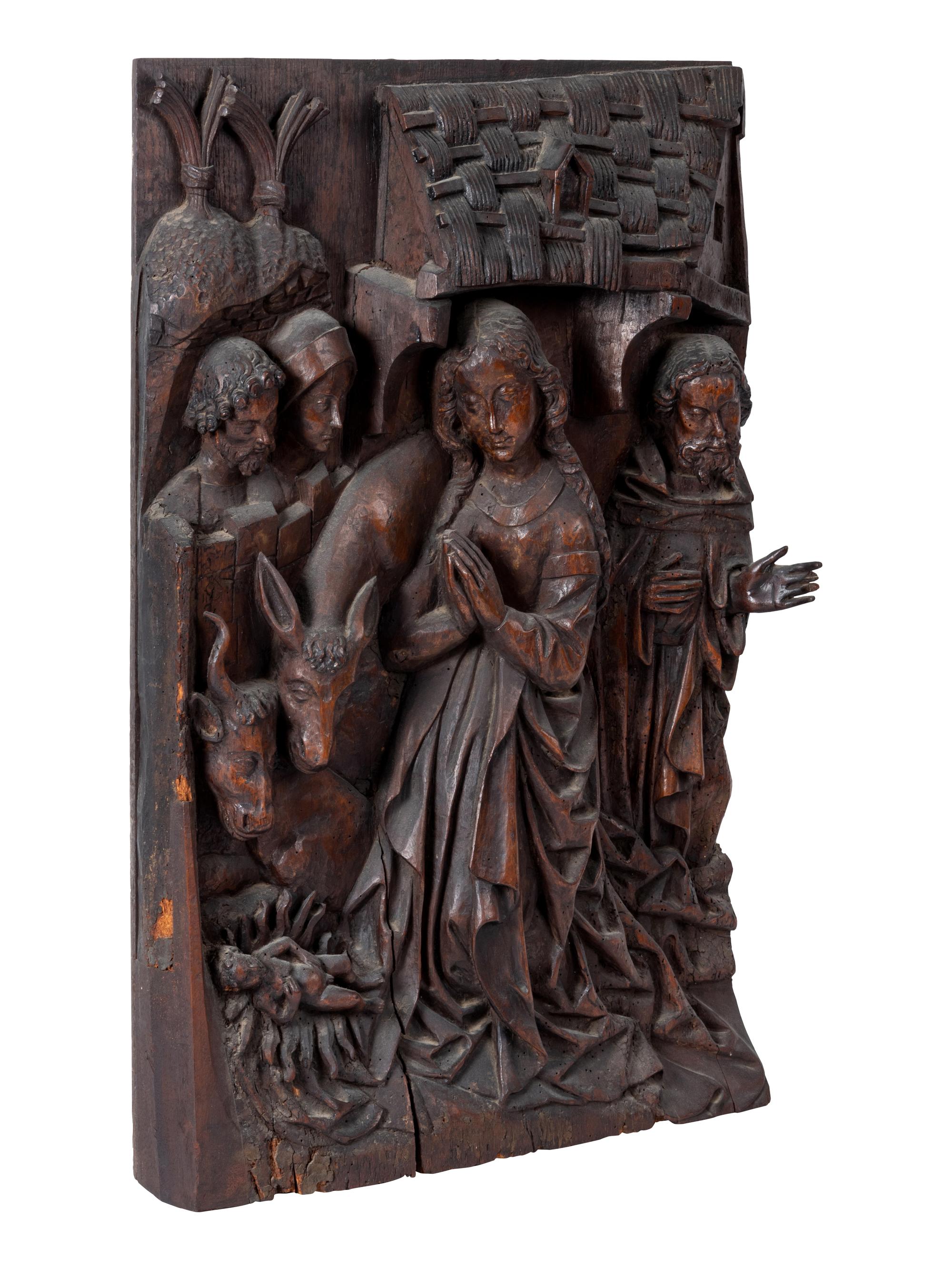 A Franco-Flemish Carved Chestnut Relief Panel Depicting the Adoration of the Christ Child