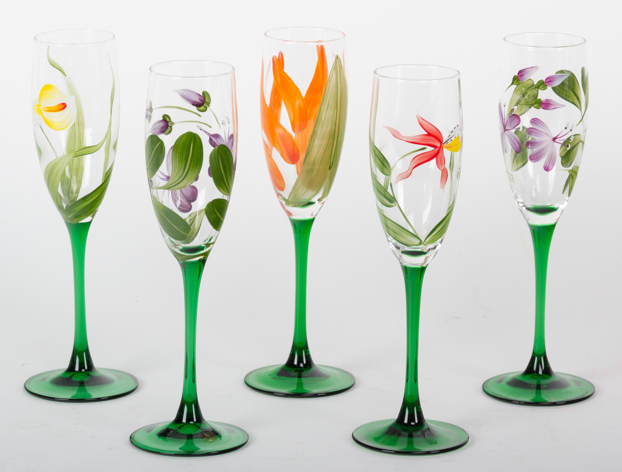 A Set of Hand Painted Champagne Flutes Height 8 3/4 inches.