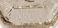 A Pair of Gianni Versace Bolt Earclips, 1.5" x 1.5".