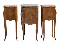 A Louis XV Style Gilt Metal and Marble Mounted Commode and Pair of Side Tables