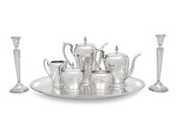 An American Silver Five-Piece Tea and Coffee Service and a Pair of Cartier Silver Candlesticks
