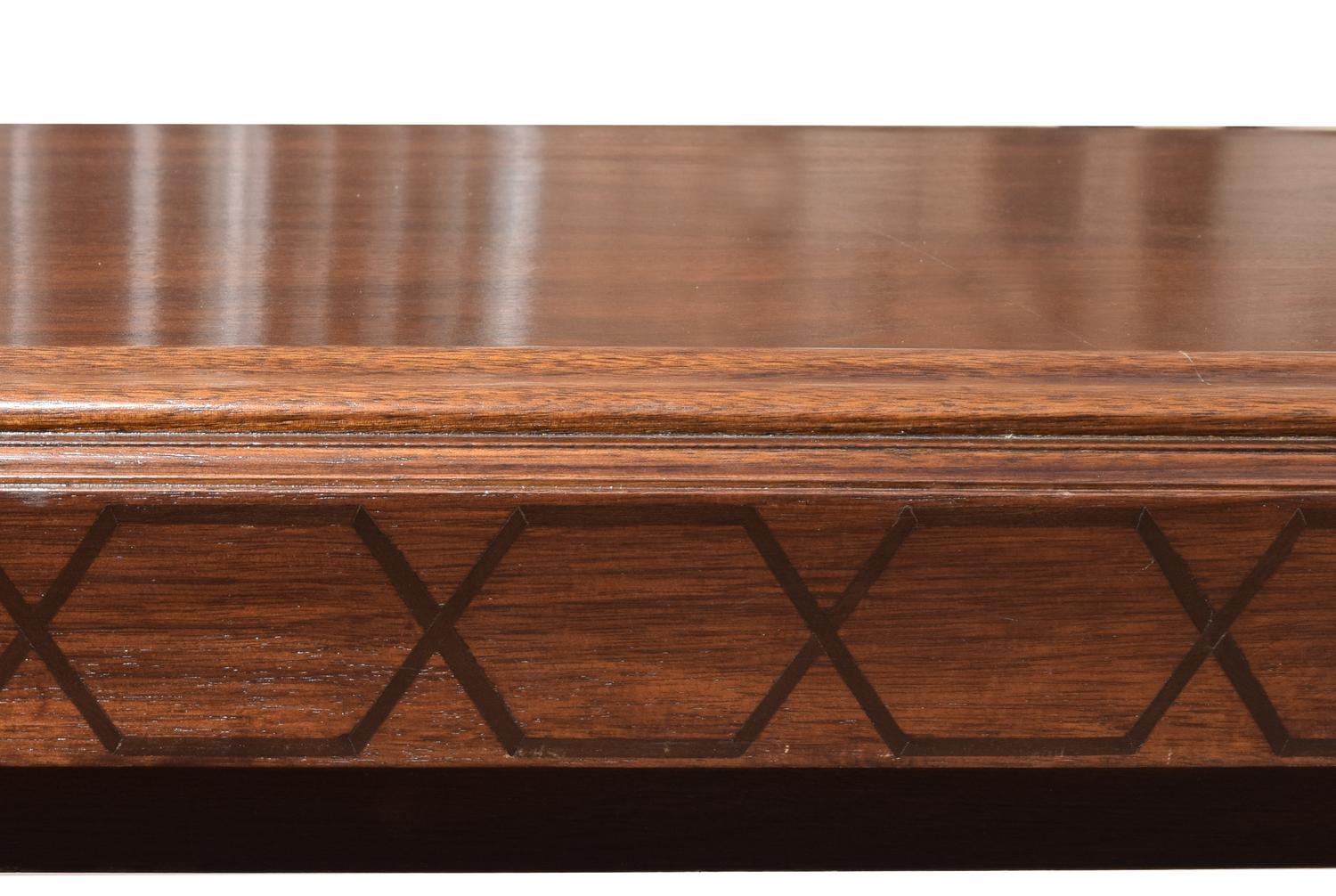 A Mahogany and Ebony Inlaid Library Table 138" W x 36" D x 33" H — United States, Early 20th Century