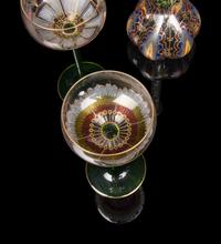 A Set of Four Enameled Glass Wine Hocks and Decanter