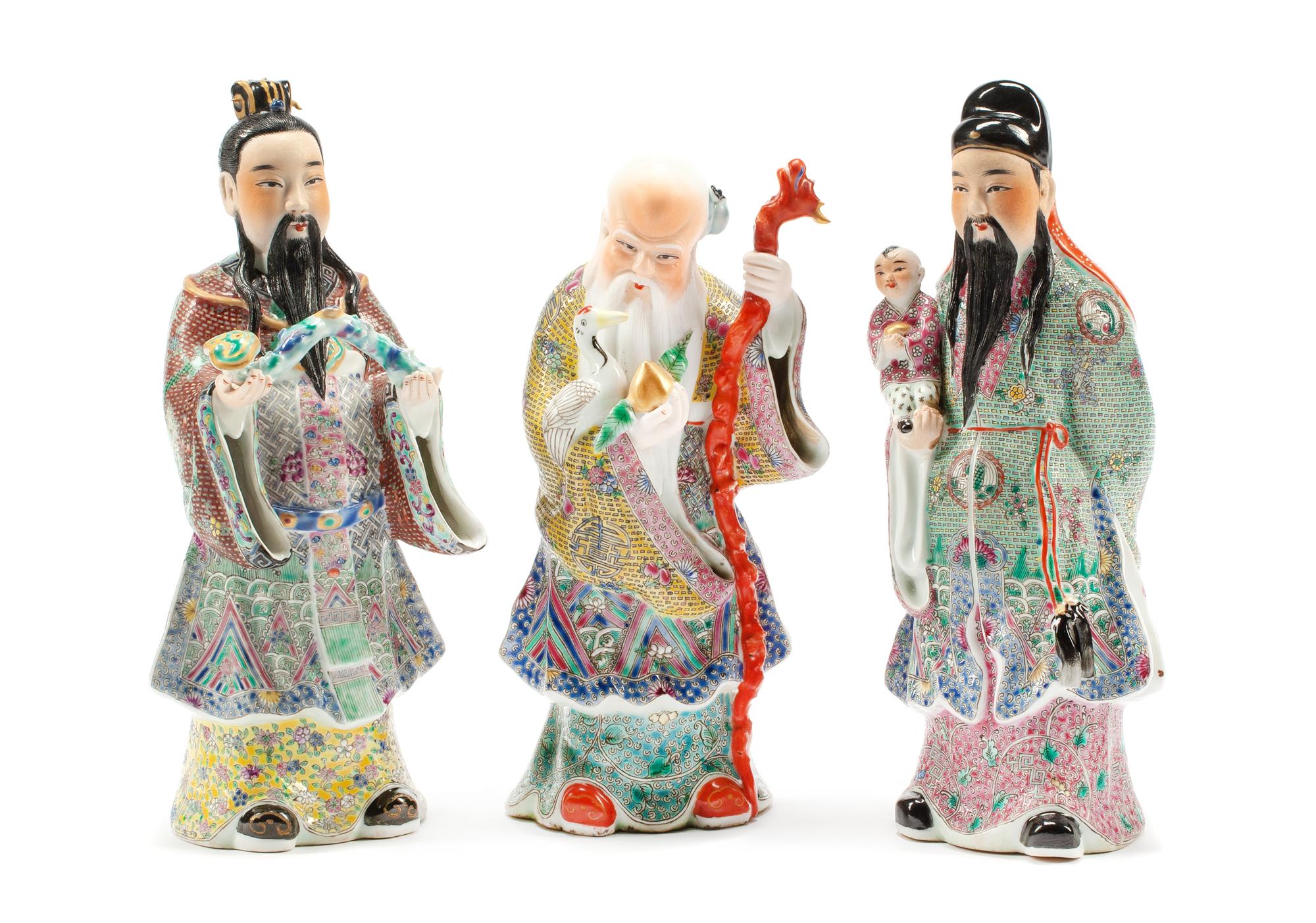 Three Chinese Enameled Porcelain Figures Height of tallest 9 1/2 inches.