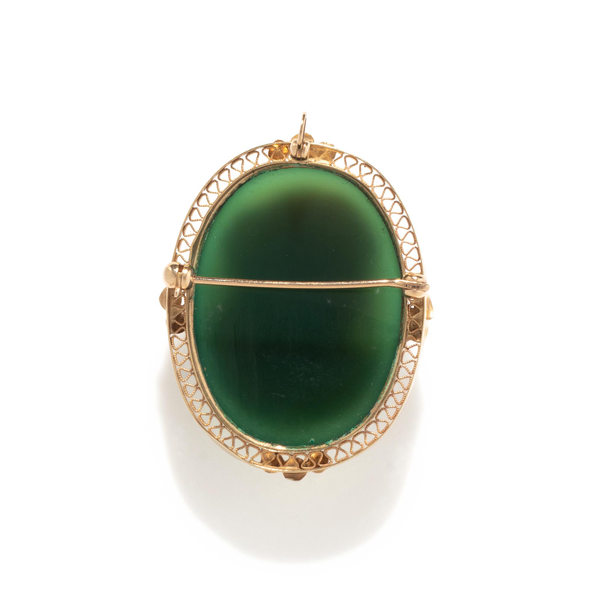 A Victorian Green Glass Cameo Brooch with a Female Portrait Bust