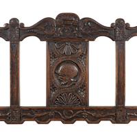 A Continental Carved Oak Hall Bench