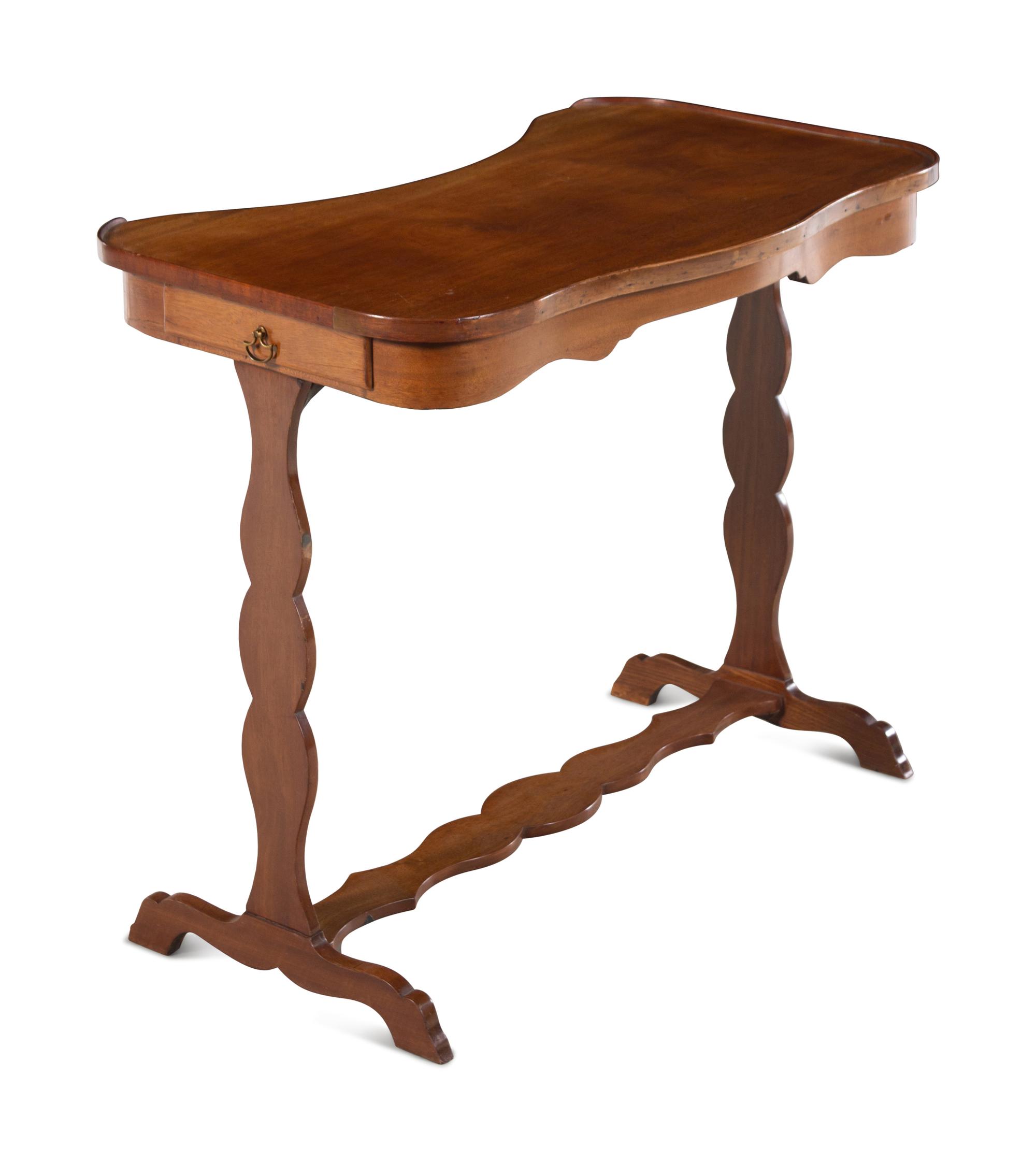 A French Mahogany Reniform Writing Table