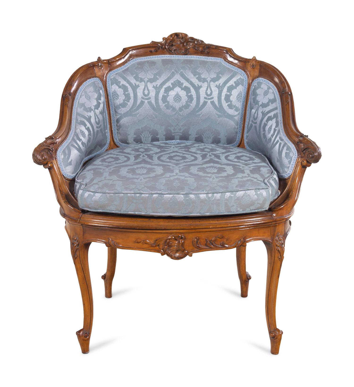 A Louis XV Style Walnut Bergère de Bureau