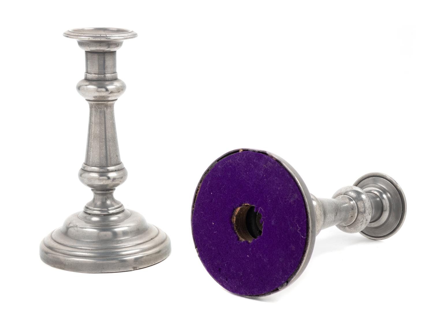 A Pair of British Pewter Candlesticks