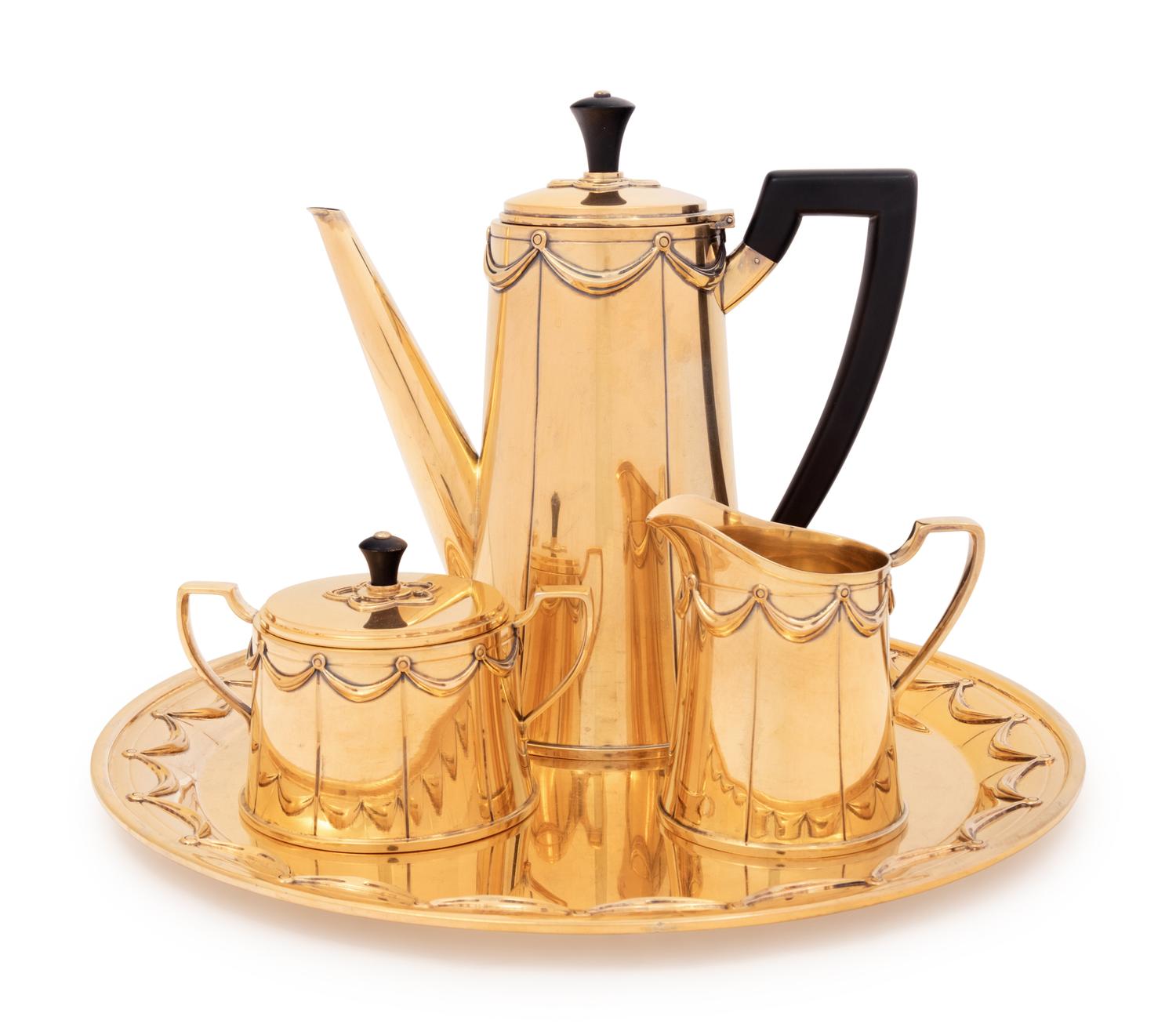 A Tiffany & Co. Silver-Gilt Four-Piece Coffee Service
