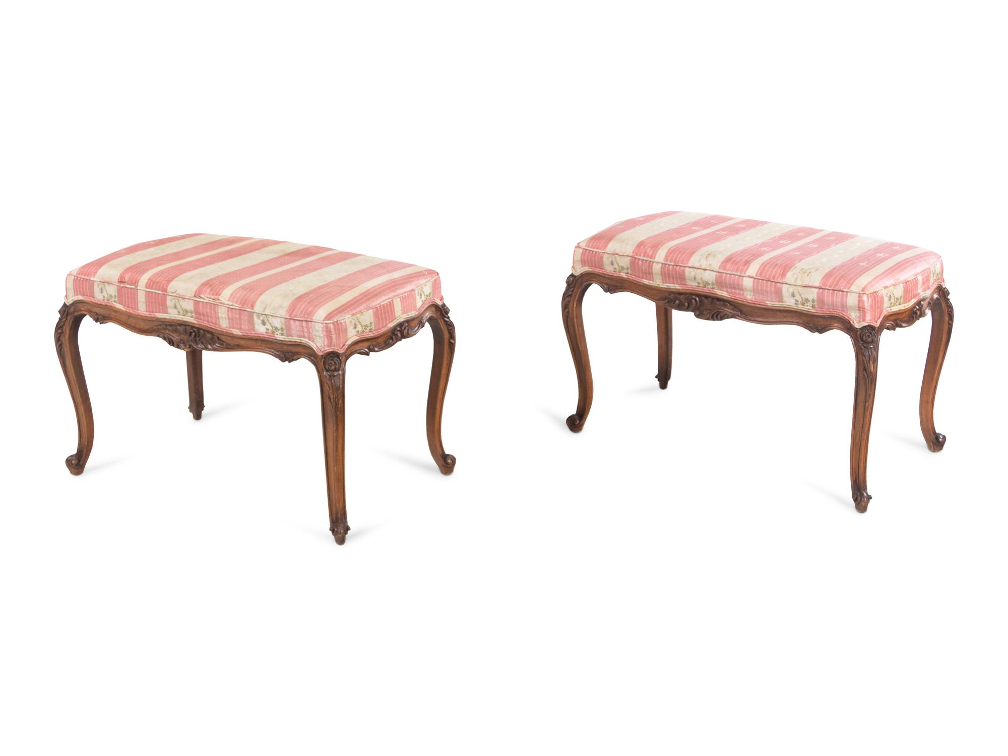 A Pair of Louis XV Style Walnut Banquettes