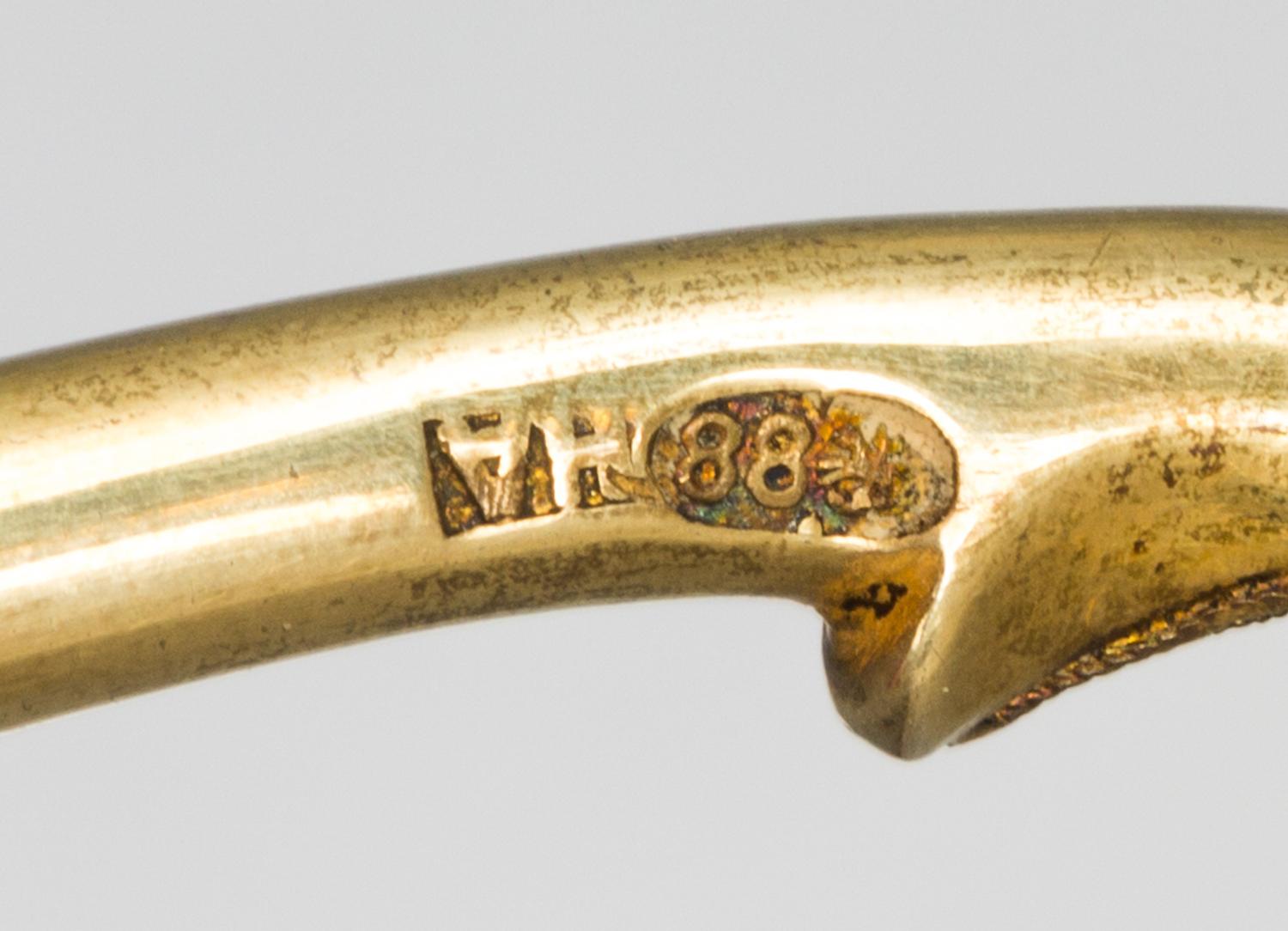 A Russian Silver-Gilt and Enameled Spoon, Mark of Nikolai Alekseyev, Moscow, late 19th century, having a light blue enamel on a twist h