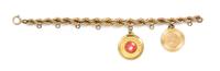 A 14 Karat Yellow Gold Charm Bracelet with Two Attached Charms, 27.20 dwts.