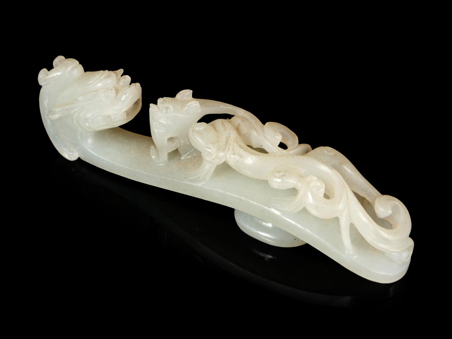 A White Jade 'Dragon' Belt Hook and A White Jade 'Double Happiness' Pendant
