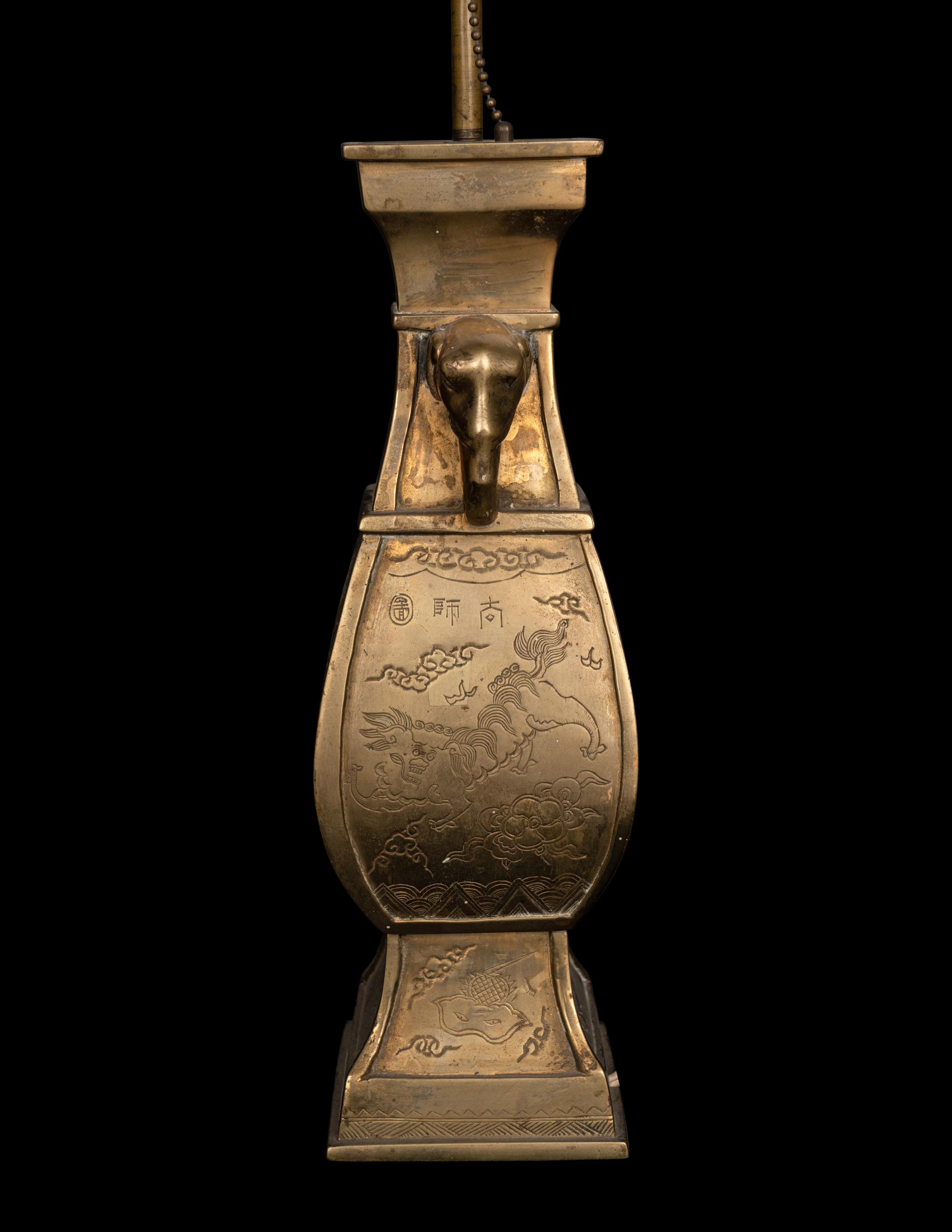 A Pair of Chinese Gilt Bronze Elephant-Head Handled Vases